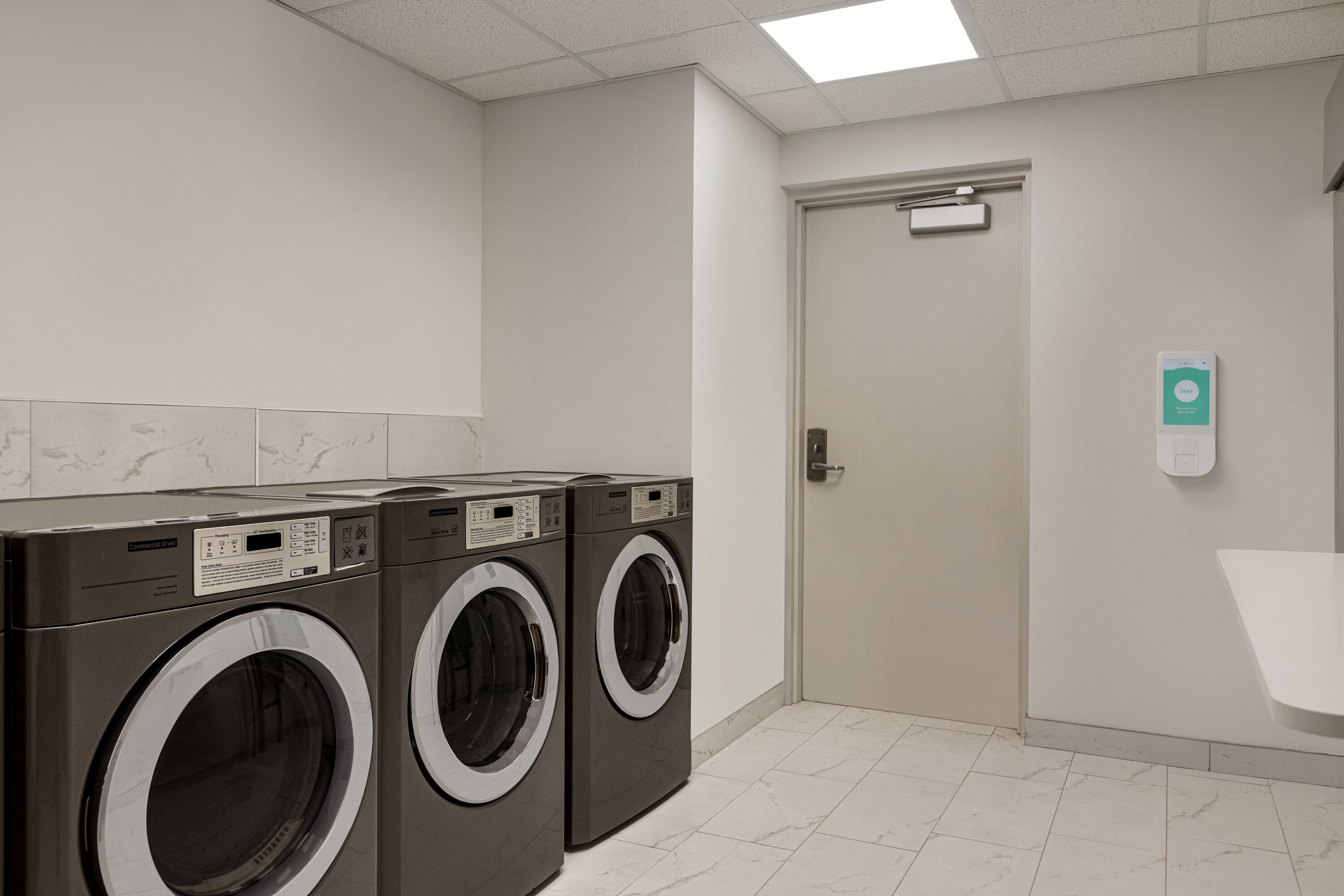 Laundry facilities at Sea Glass Beach Place, Trademark Collection by Wyndham in Lauderdale-By-The-Sea, Florida