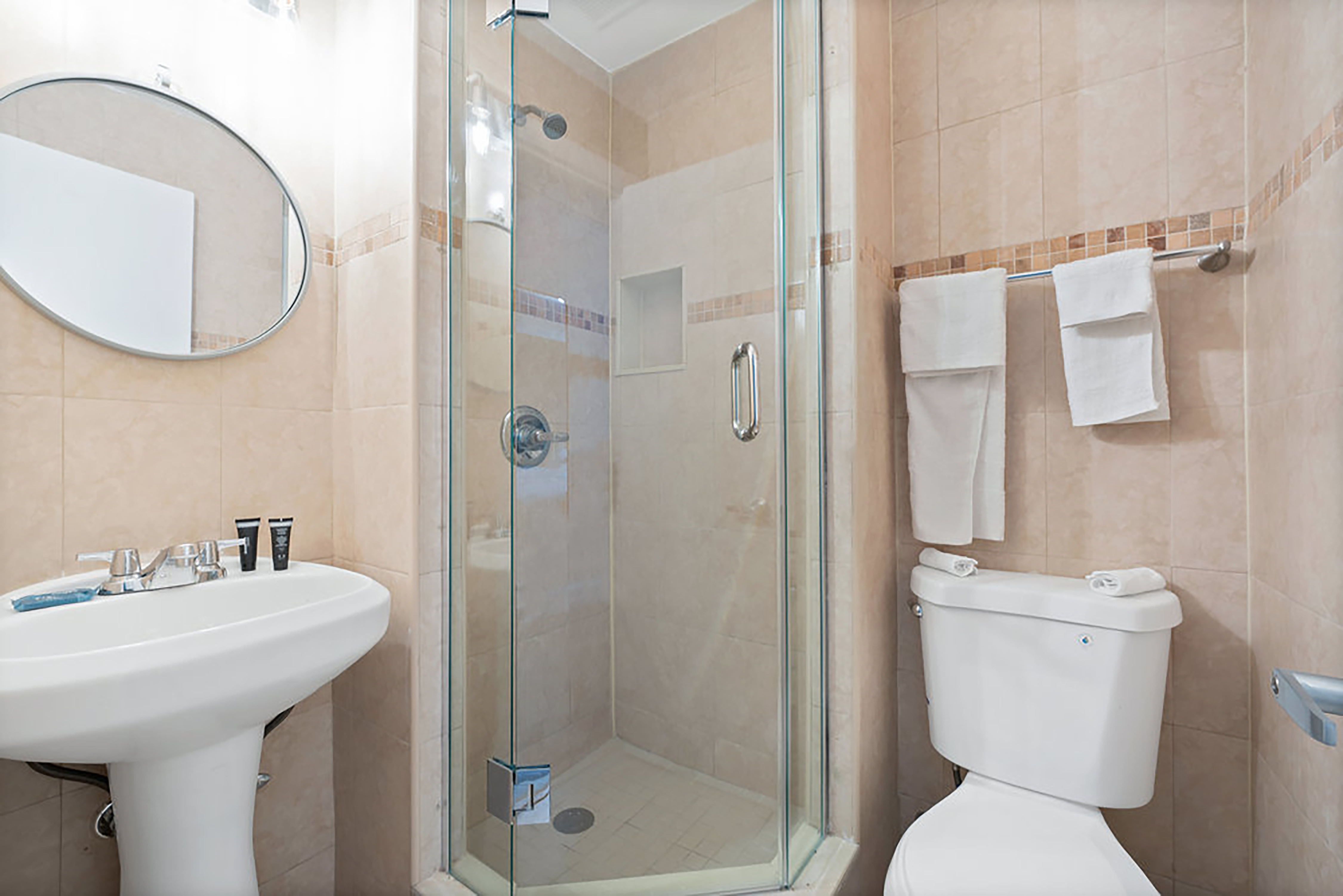 Guest room bath at the Atrium Hotel, Trademark Collection by Wyndham in Miami Springs, Florida