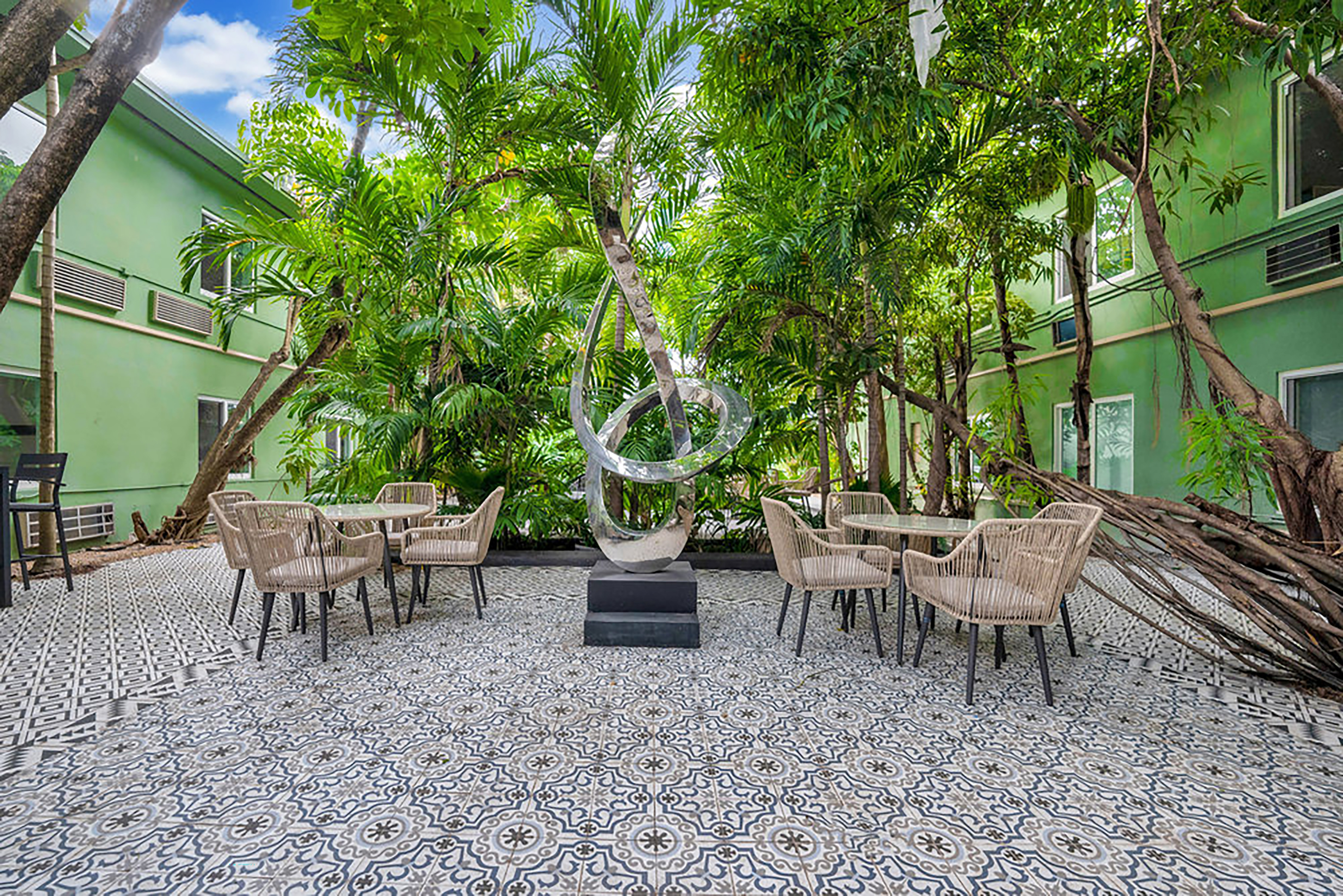 Courtyard at Atrium Hotel, Trademark Collection by Wyndham in Miami Springs, Florida