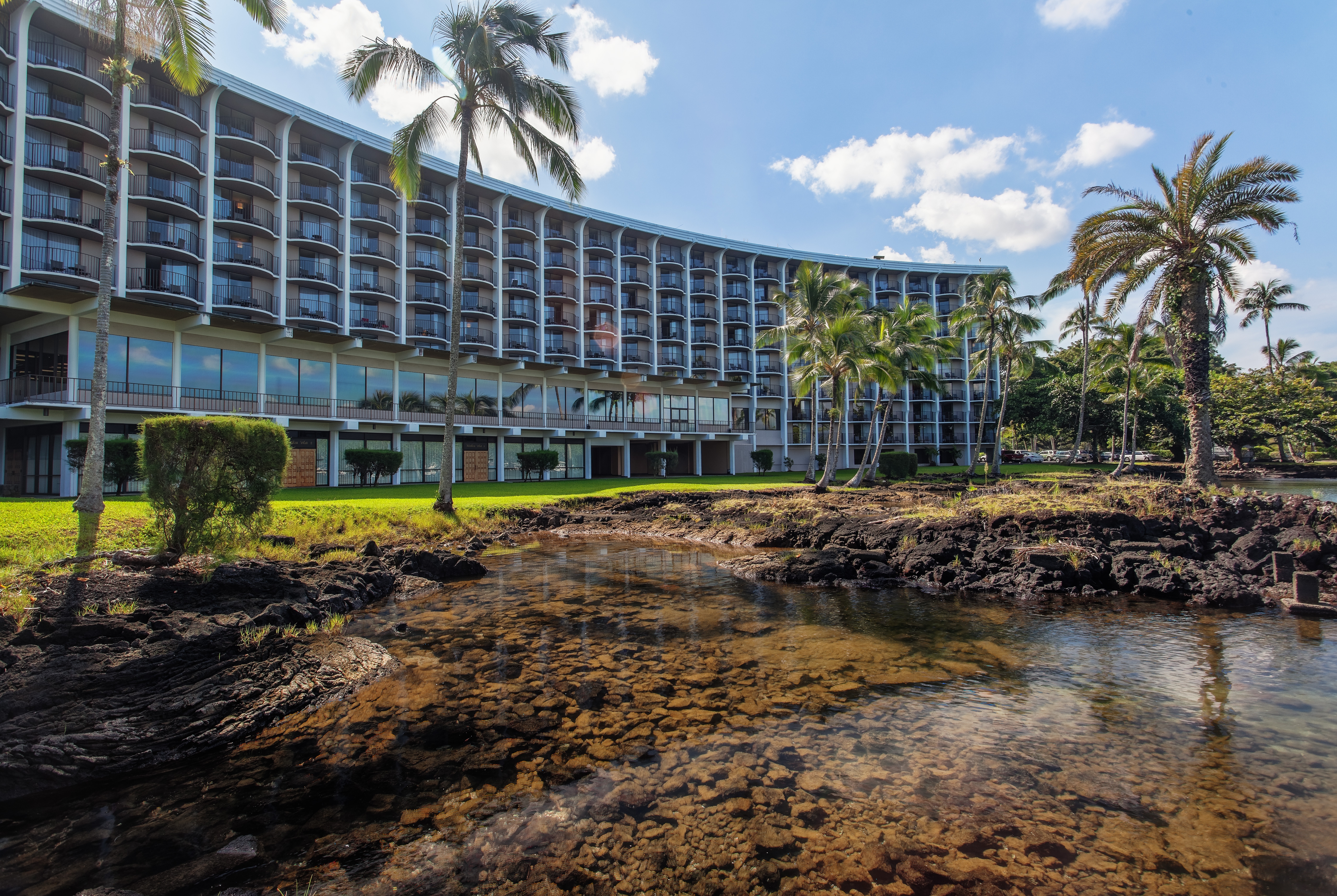 Exterior of Hilo Hawaiian Hotel, Trademark Collection by Wyndham hotel in Hilo, Hawaii