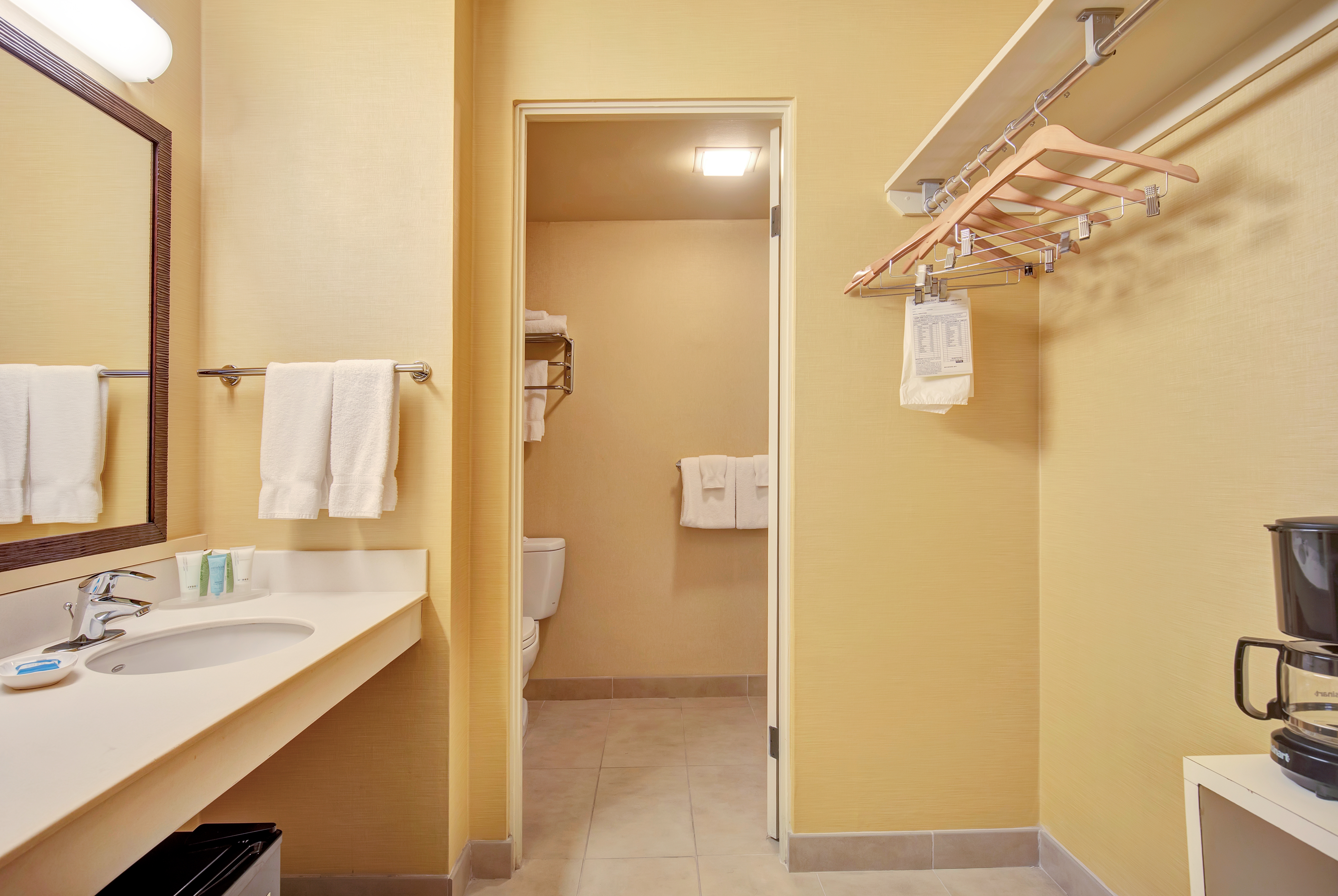 Guest room bath at the Hilo Hawaiian Hotel, Trademark Collection by Wyndham in Hilo, Hawaii