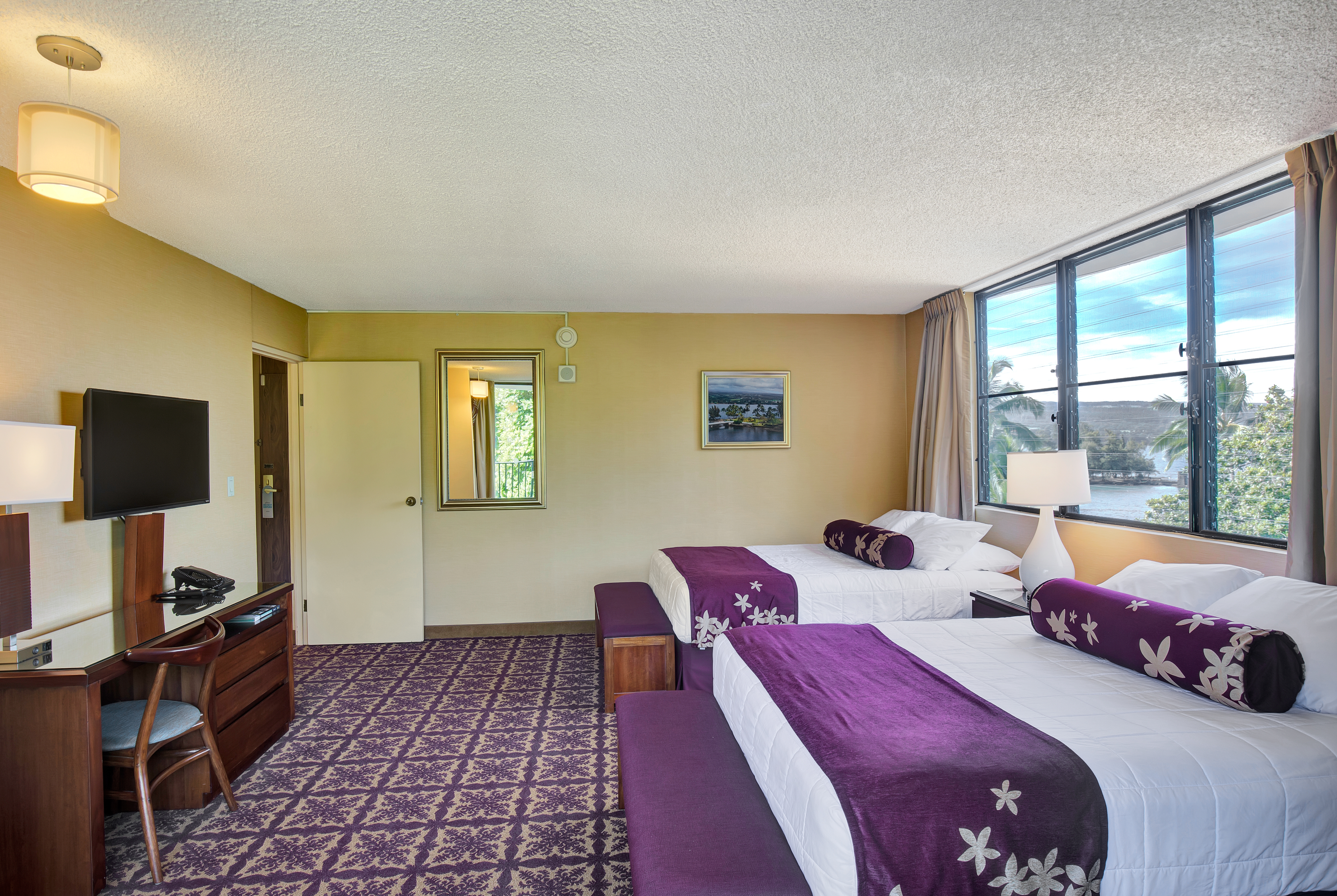 Guest room at the Hilo Hawaiian Hotel, Trademark Collection by Wyndham in Hilo, Hawaii