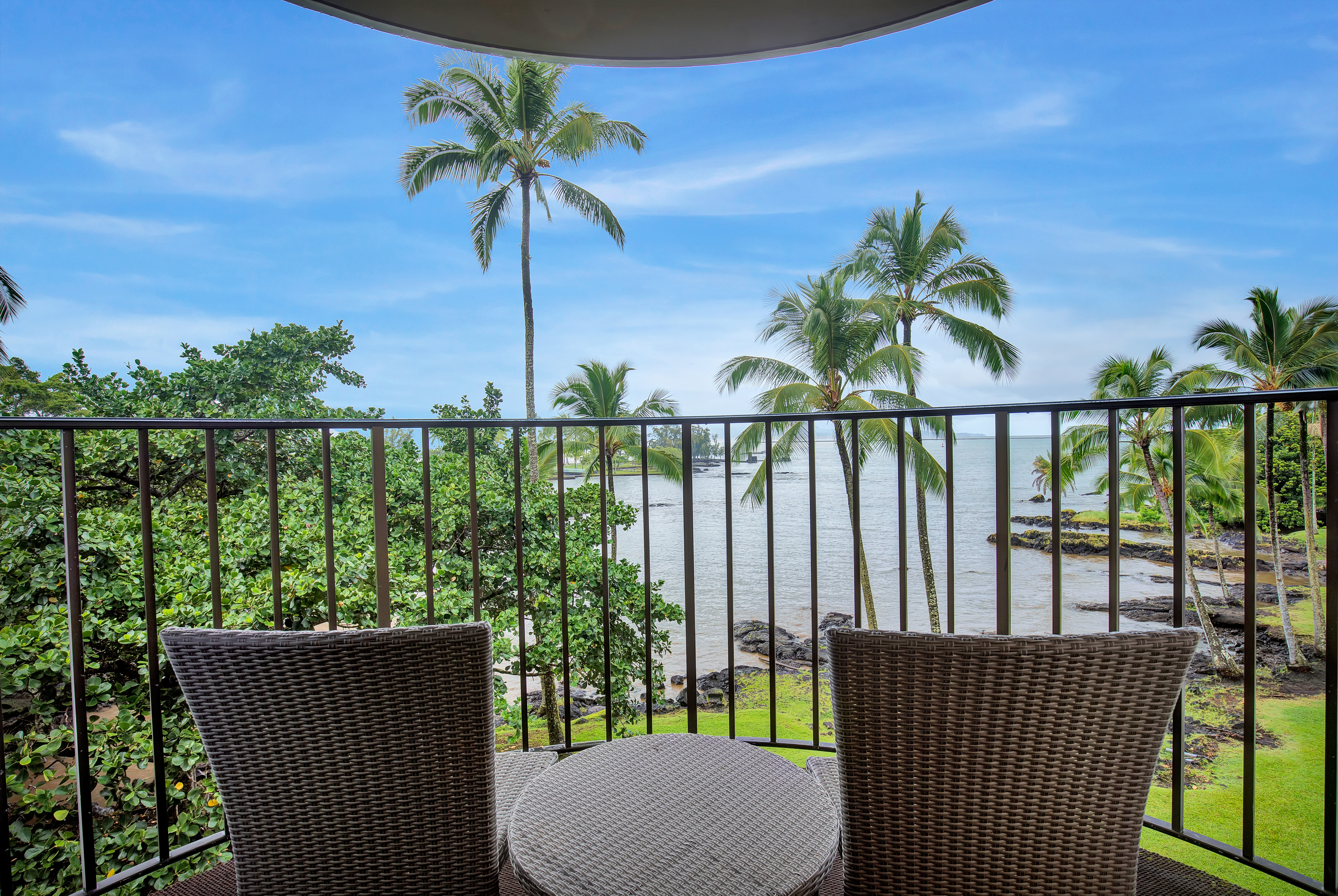 Guest room at the Hilo Hawaiian Hotel, Trademark Collection by Wyndham in Hilo, Hawaii