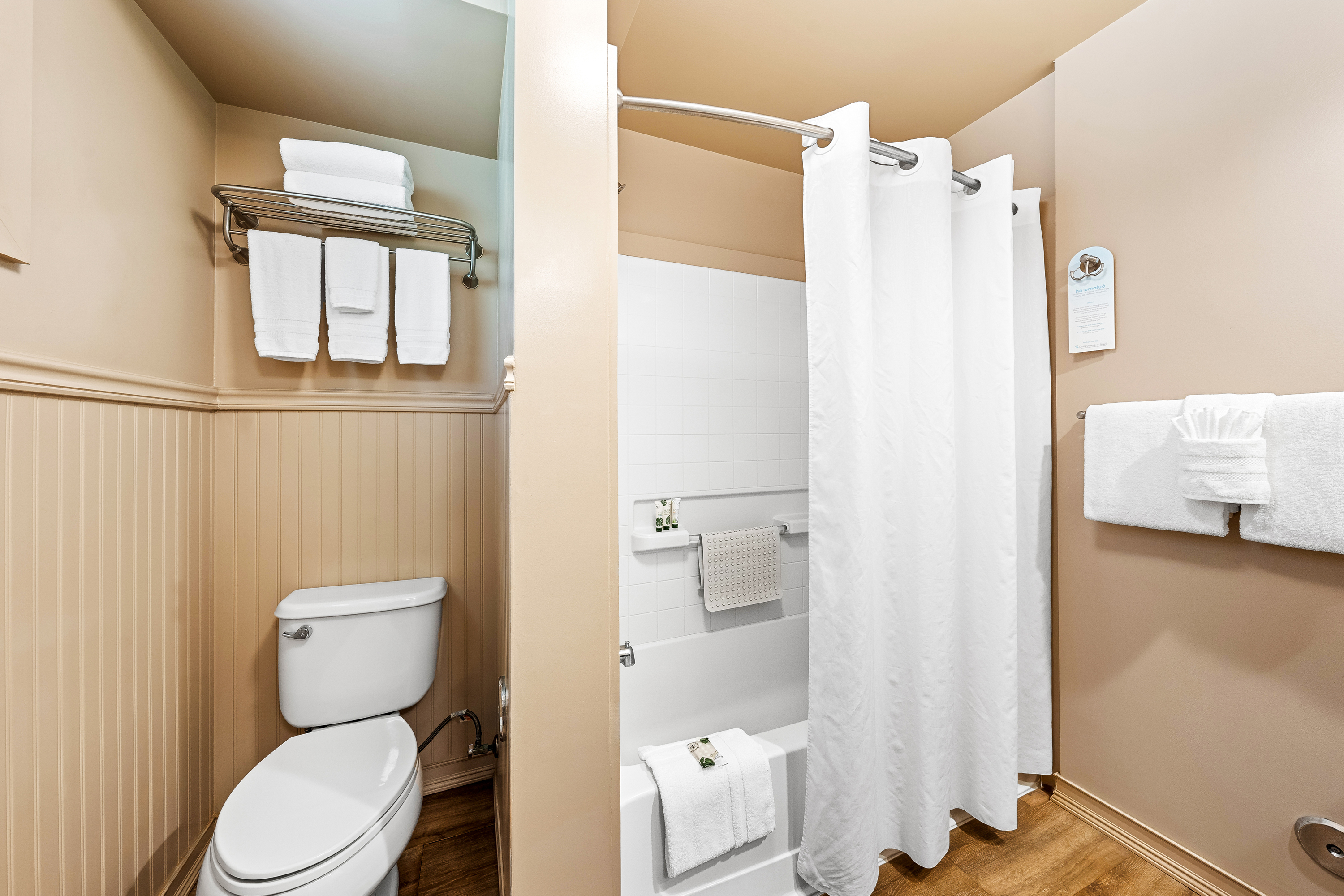 Guest room bath at the THE ISO HOTEL, Trademark Collection by Wyndham in Kapaa, Hawaii