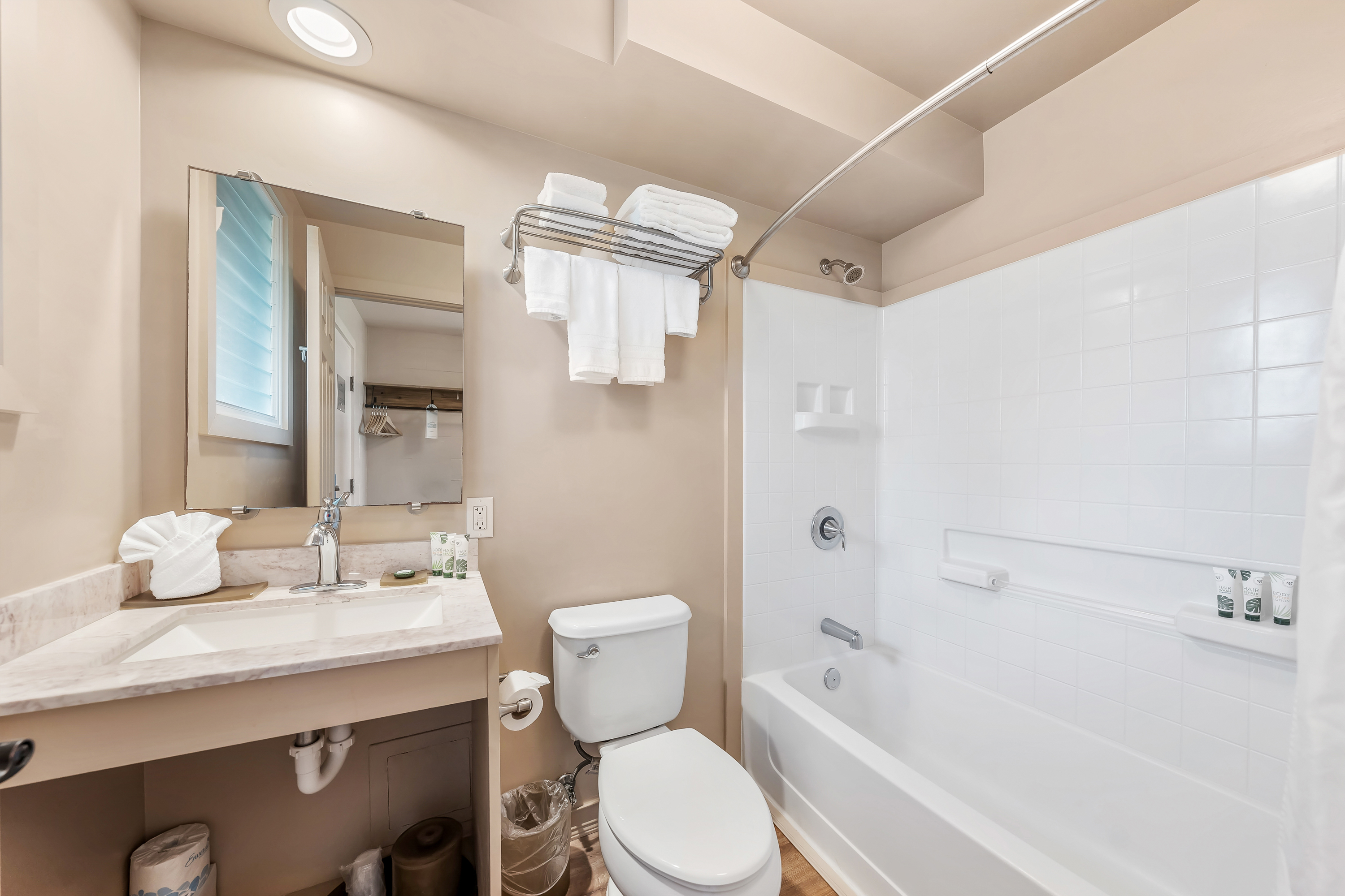 Guest room bath at the THE ISO HOTEL, Trademark Collection by Wyndham in Kapaa, Hawaii