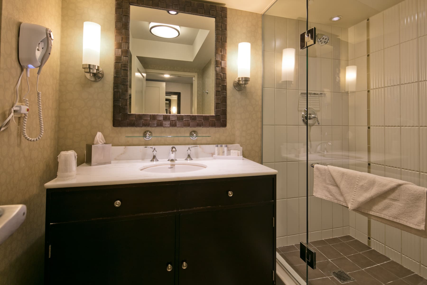 Guest room bath at the Isle Casino Hotel Bettendorf Trademark Collection by Wyndham in Bettendorf, Iowa
