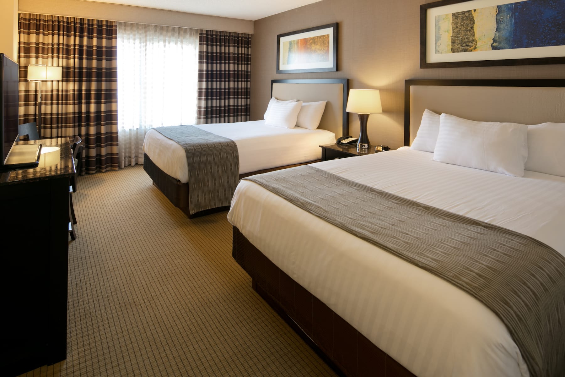 Guest room at the Isle Casino Hotel Bettendorf Trademark Collection by Wyndham in Bettendorf, Iowa