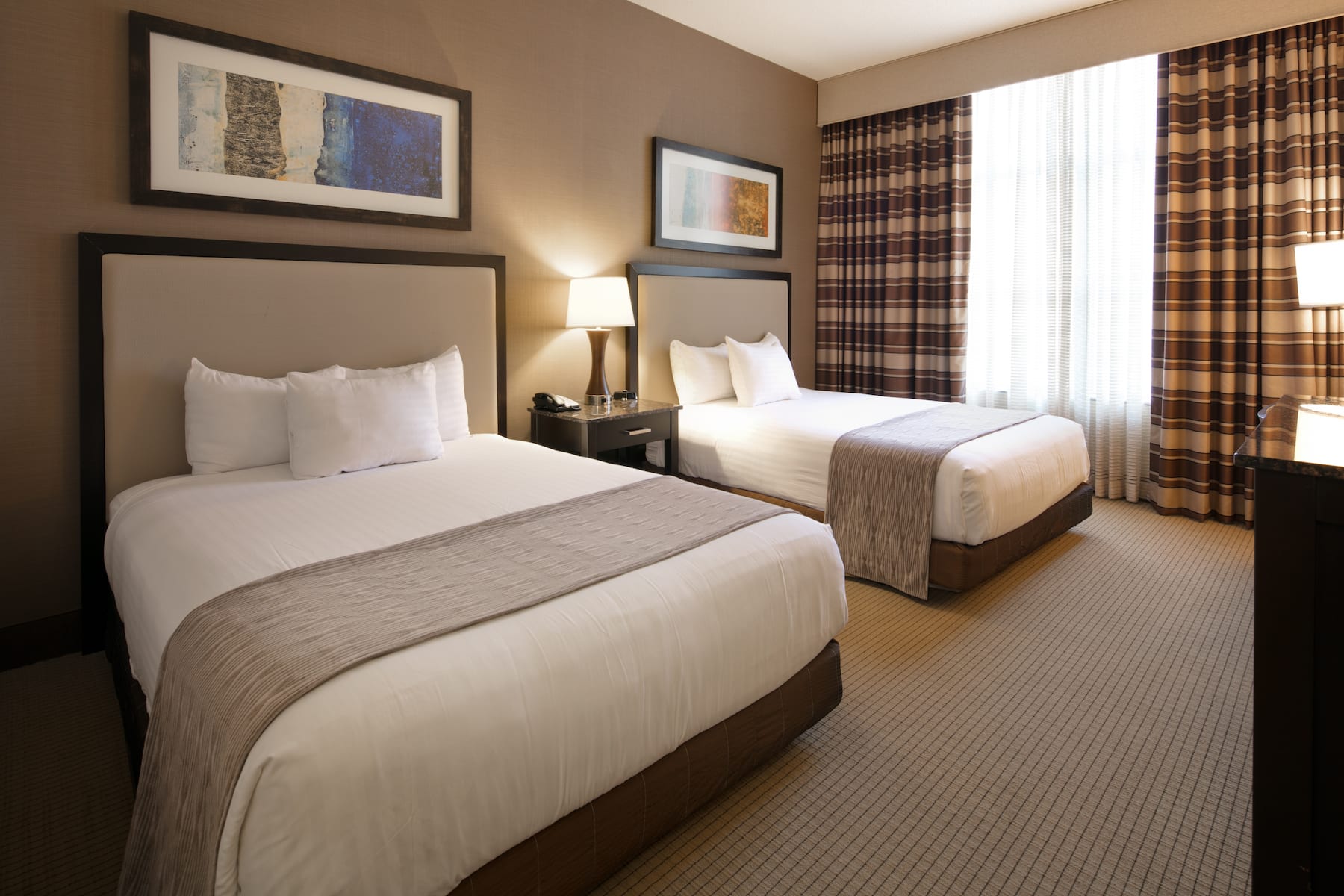 Guest room at the Isle Casino Hotel Bettendorf Trademark Collection by Wyndham in Bettendorf, Iowa
