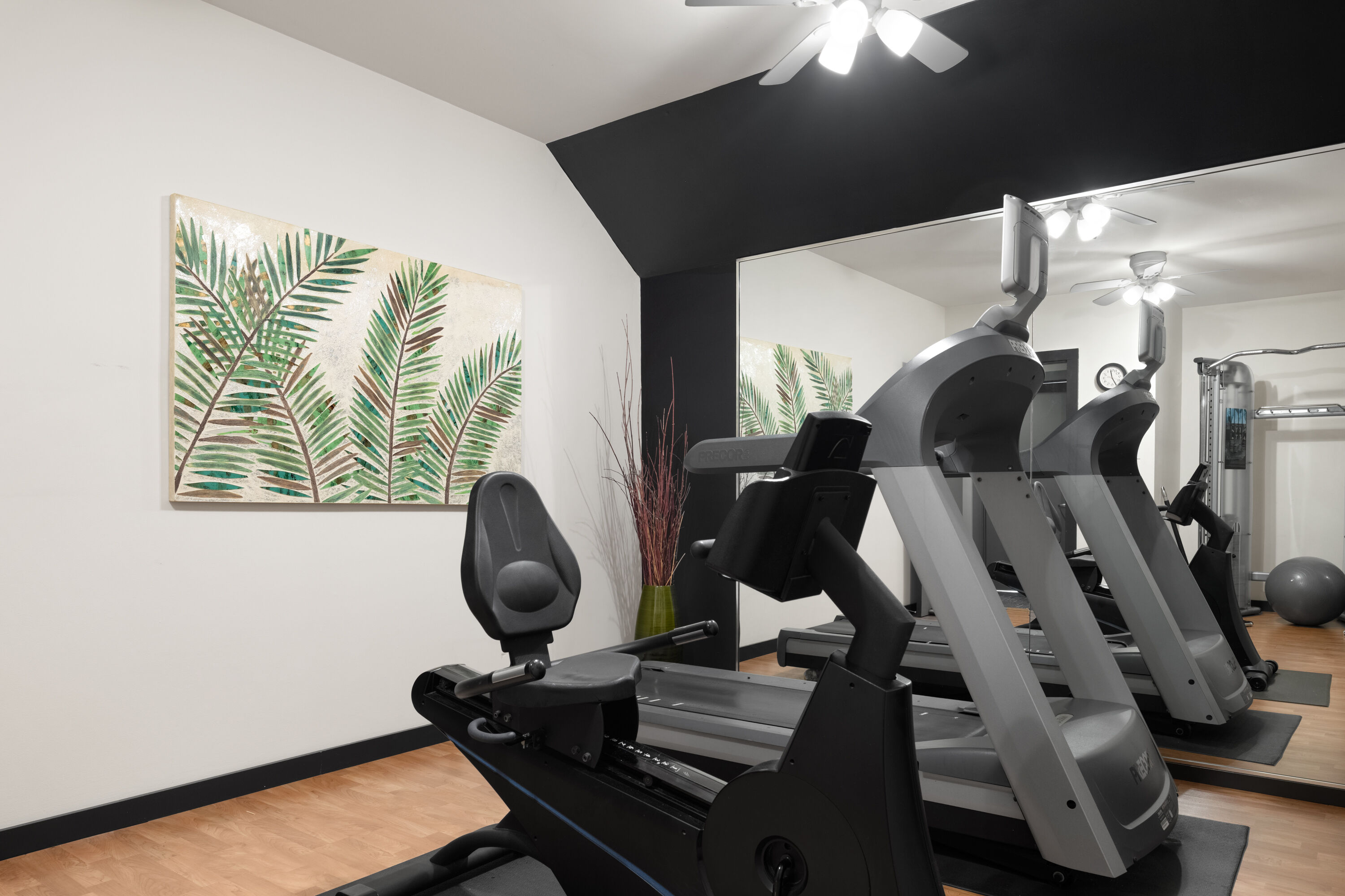 Fitness room at Eastland Suites Hotel & Conference Ctr, Trademark by Wyndham in Bloomington, Illinois