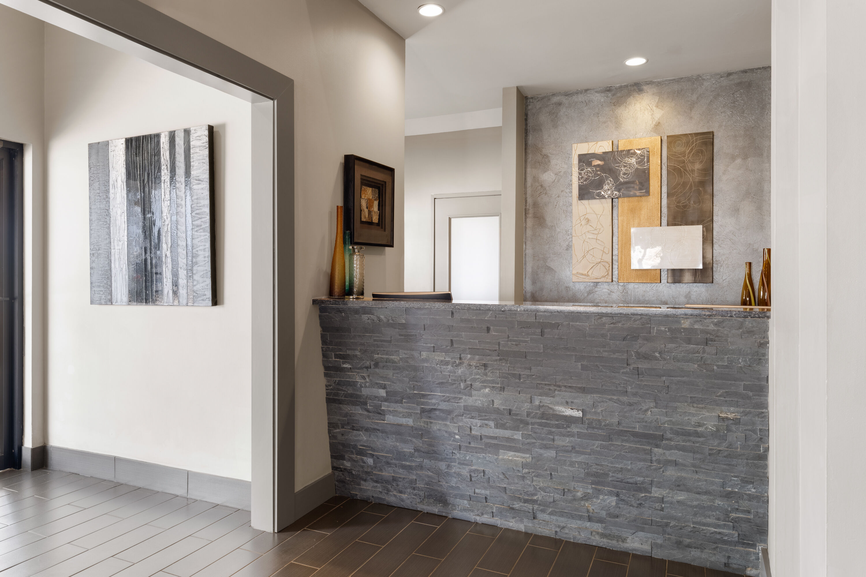 Eastland Suites Hotel & Conference Ctr, Trademark by Wyndham reception in Bloomington, Illinois