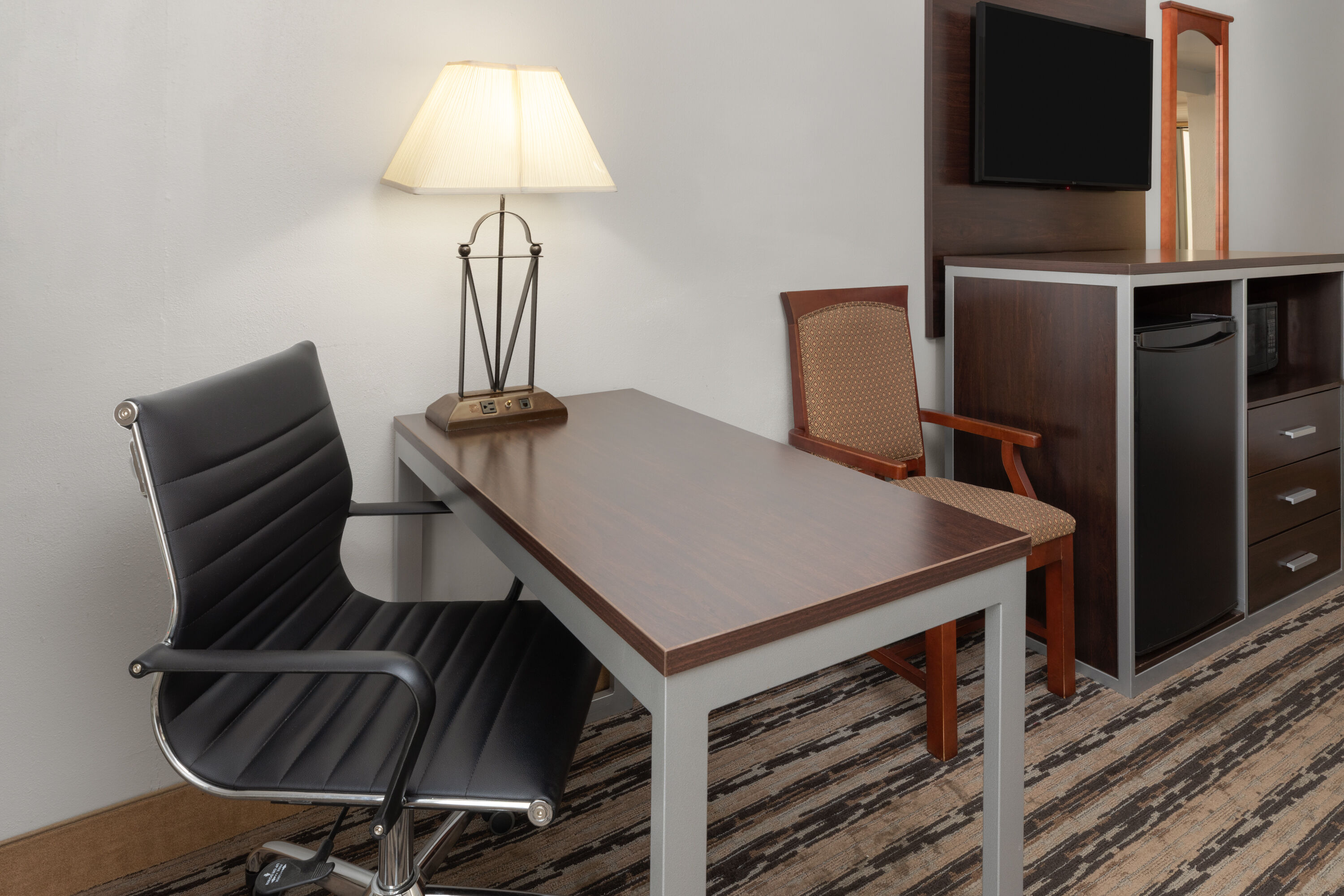 Guest room at the Endeavor Inn & Suites, Trademark Collection by Wyndham in Topeka, Kansas