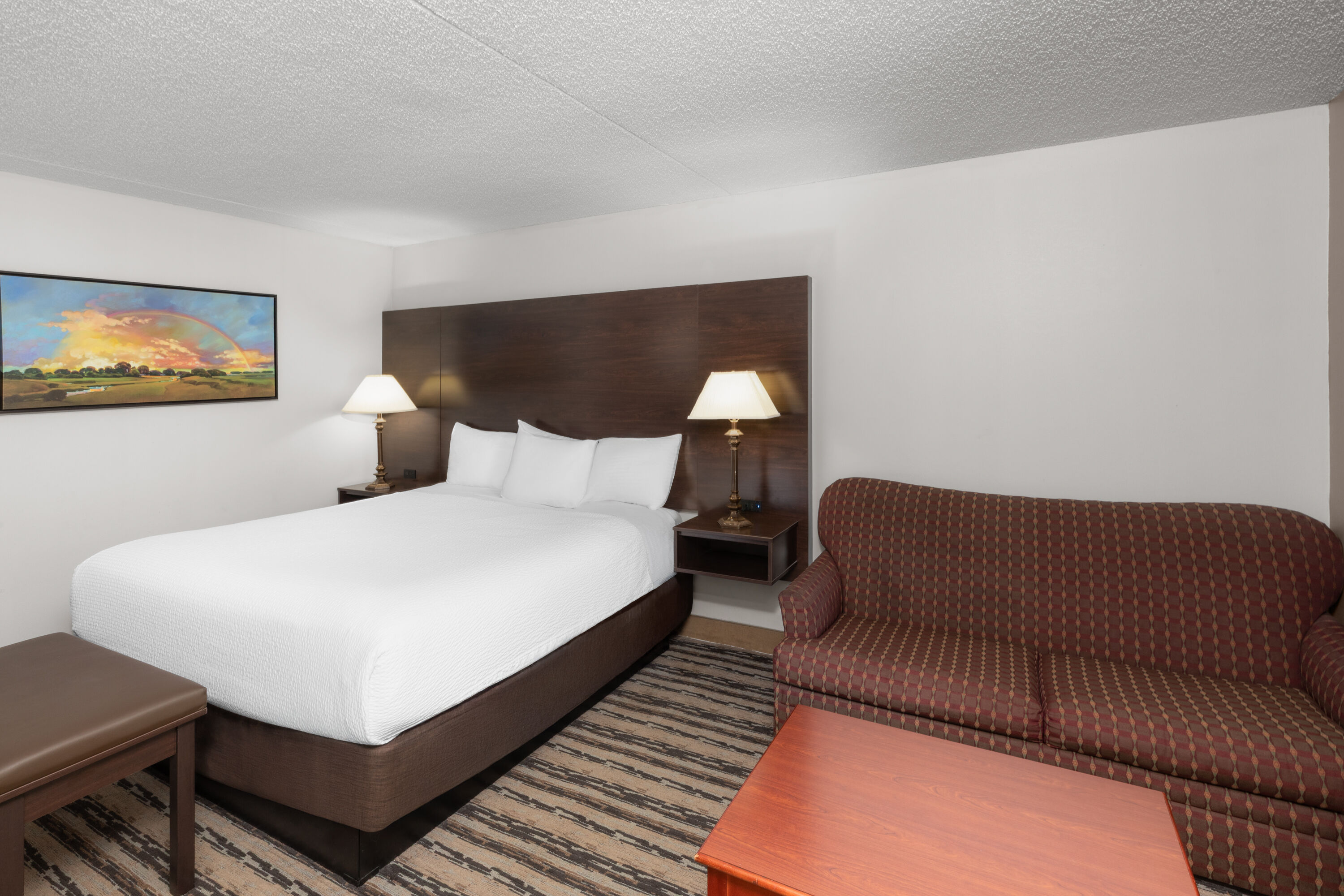 Guest room at the Endeavor Inn & Suites, Trademark Collection by Wyndham in Topeka, Kansas