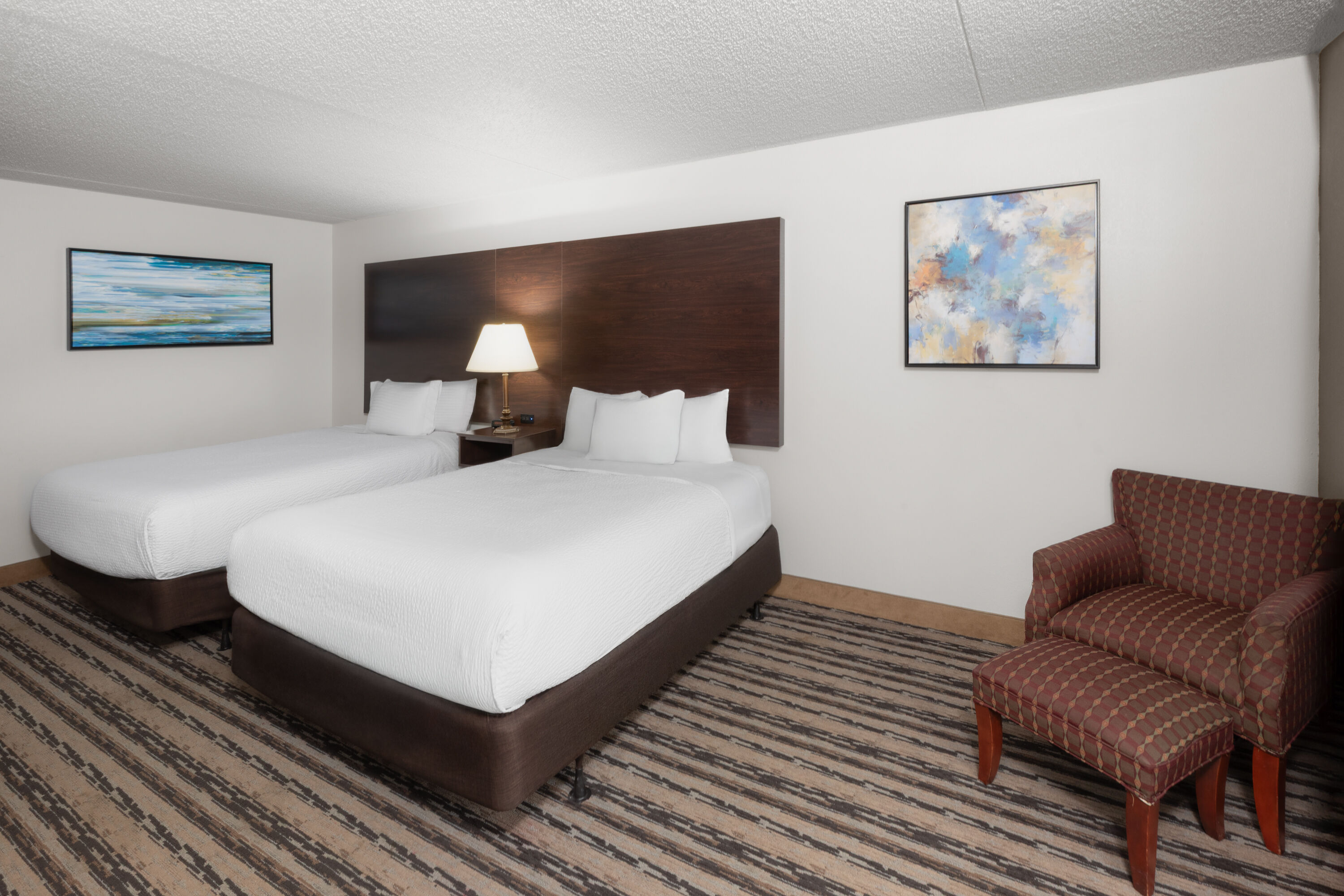 Guest room at the Endeavor Inn & Suites, Trademark Collection by Wyndham in Topeka, Kansas