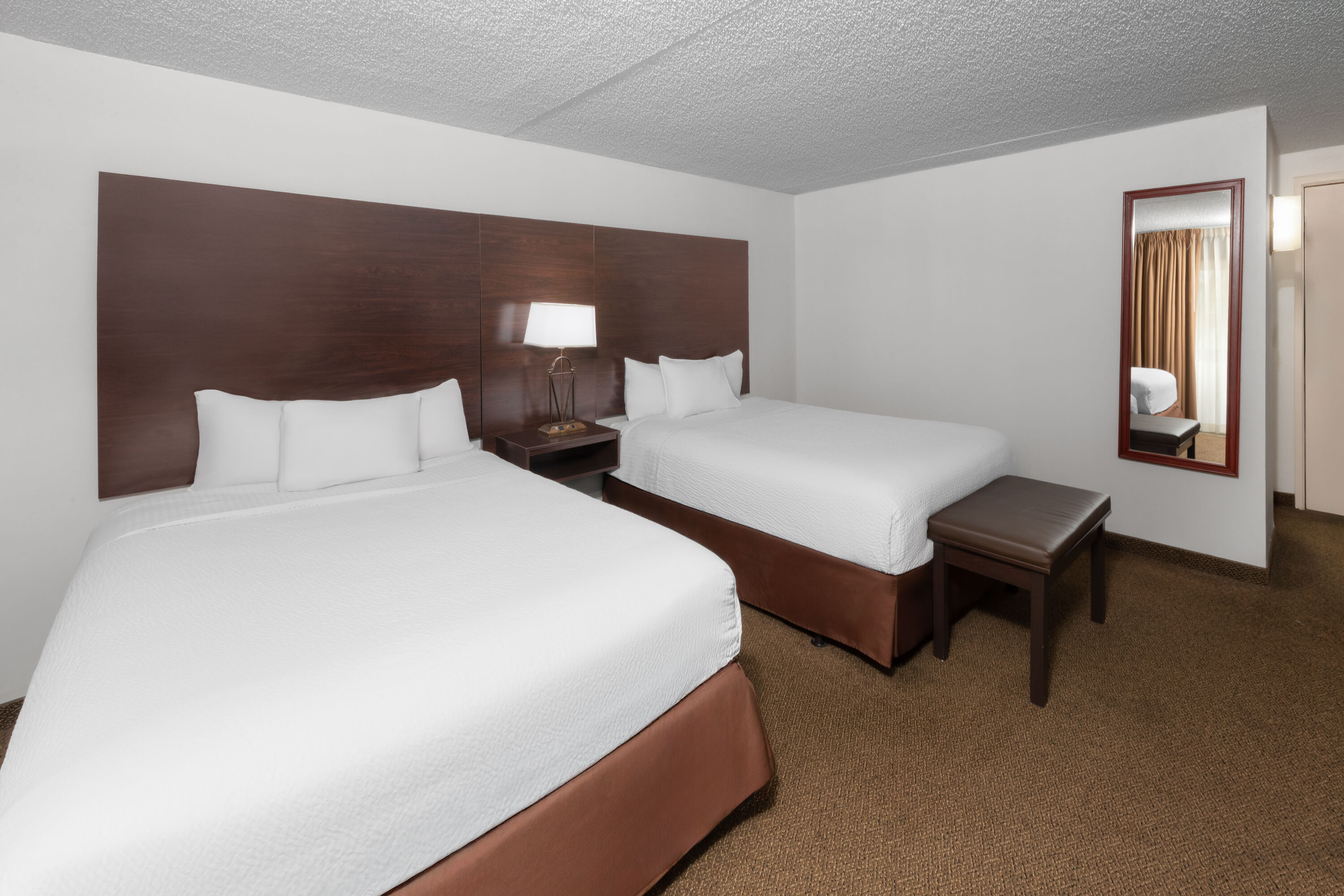 Guest room at the Endeavor Inn & Suites, Trademark Collection by Wyndham in Topeka, Kansas