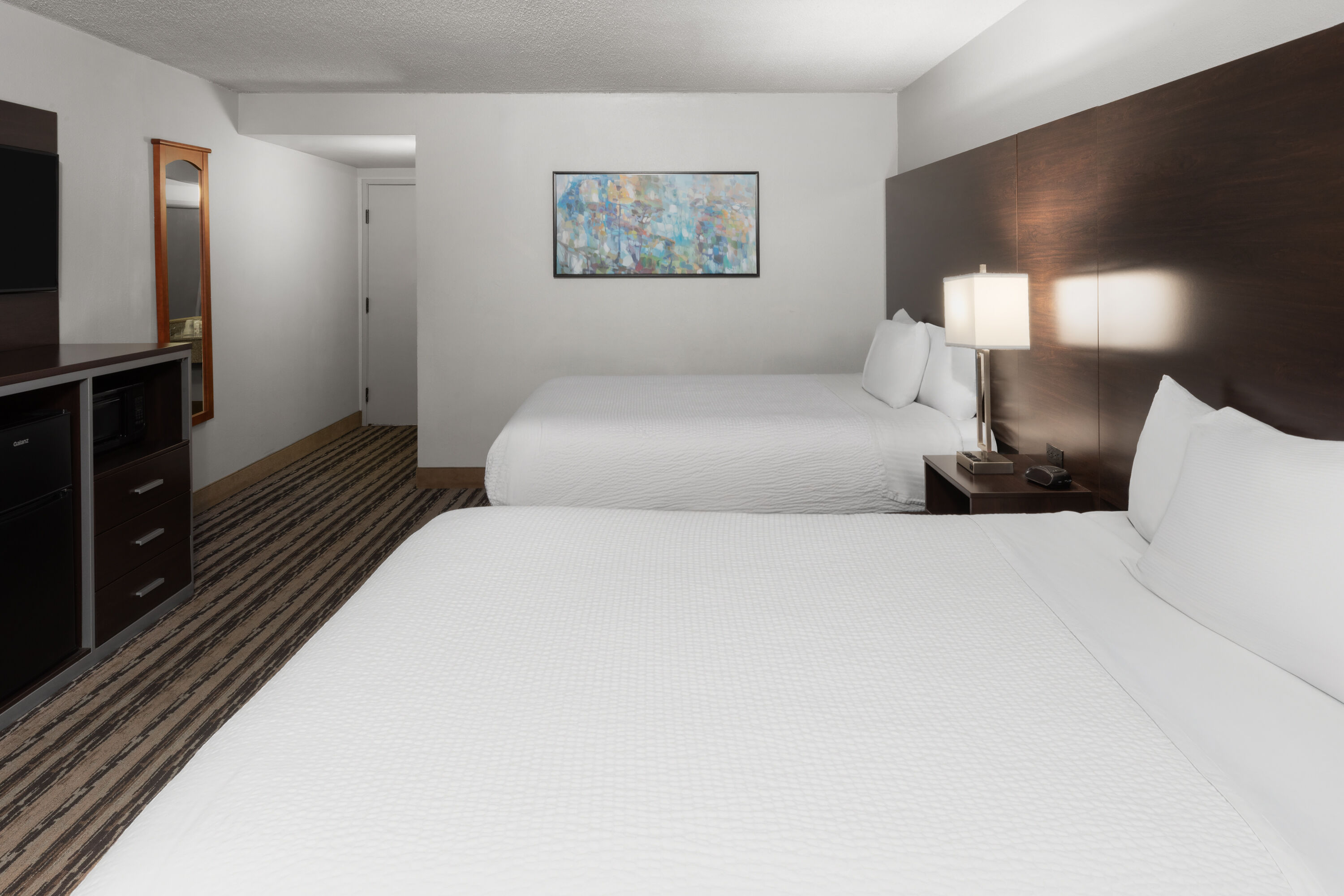 Guest room at the Endeavor Inn & Suites, Trademark Collection by Wyndham in Topeka, Kansas