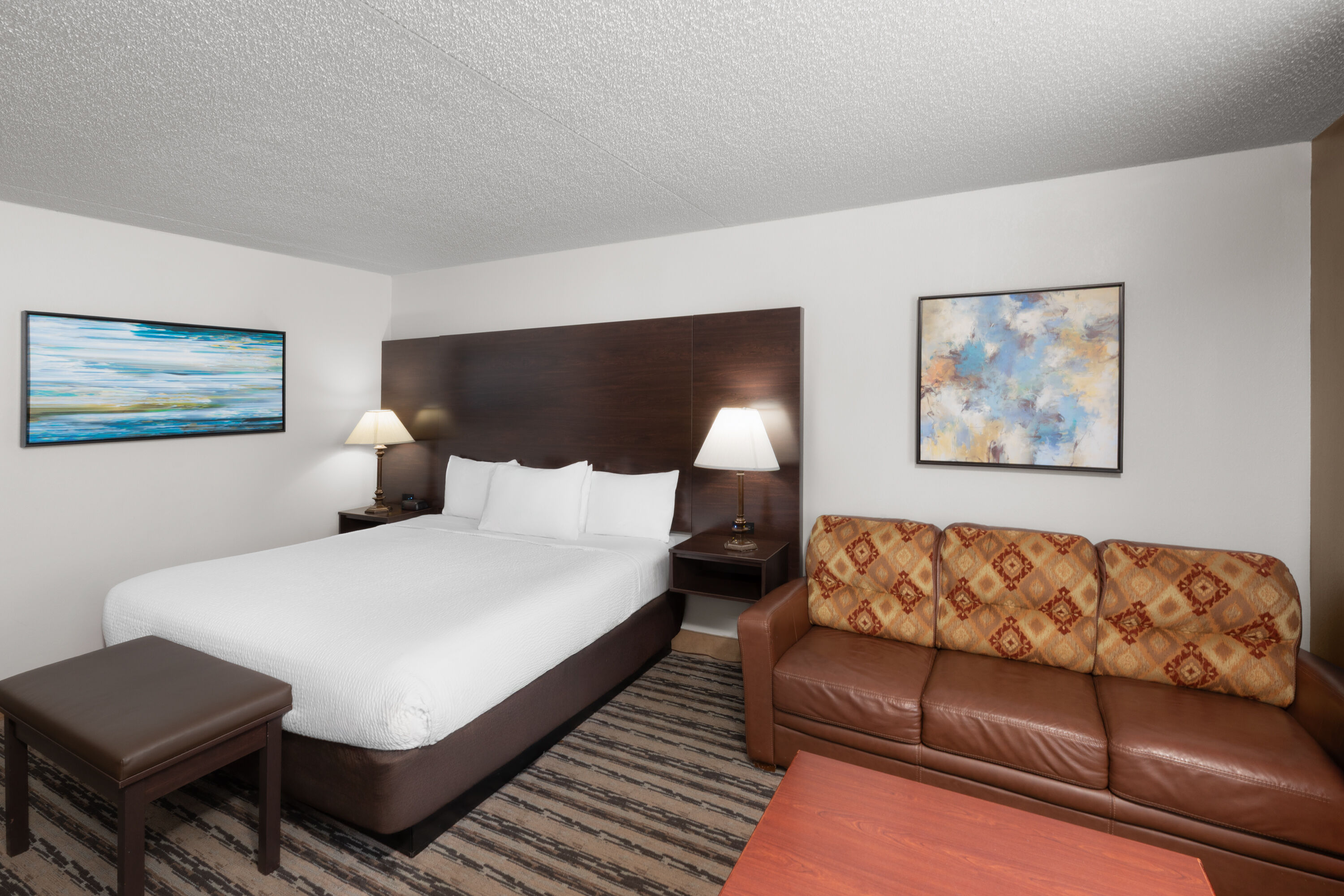 Guest room at the Endeavor Inn & Suites, Trademark Collection by Wyndham in Topeka, Kansas
