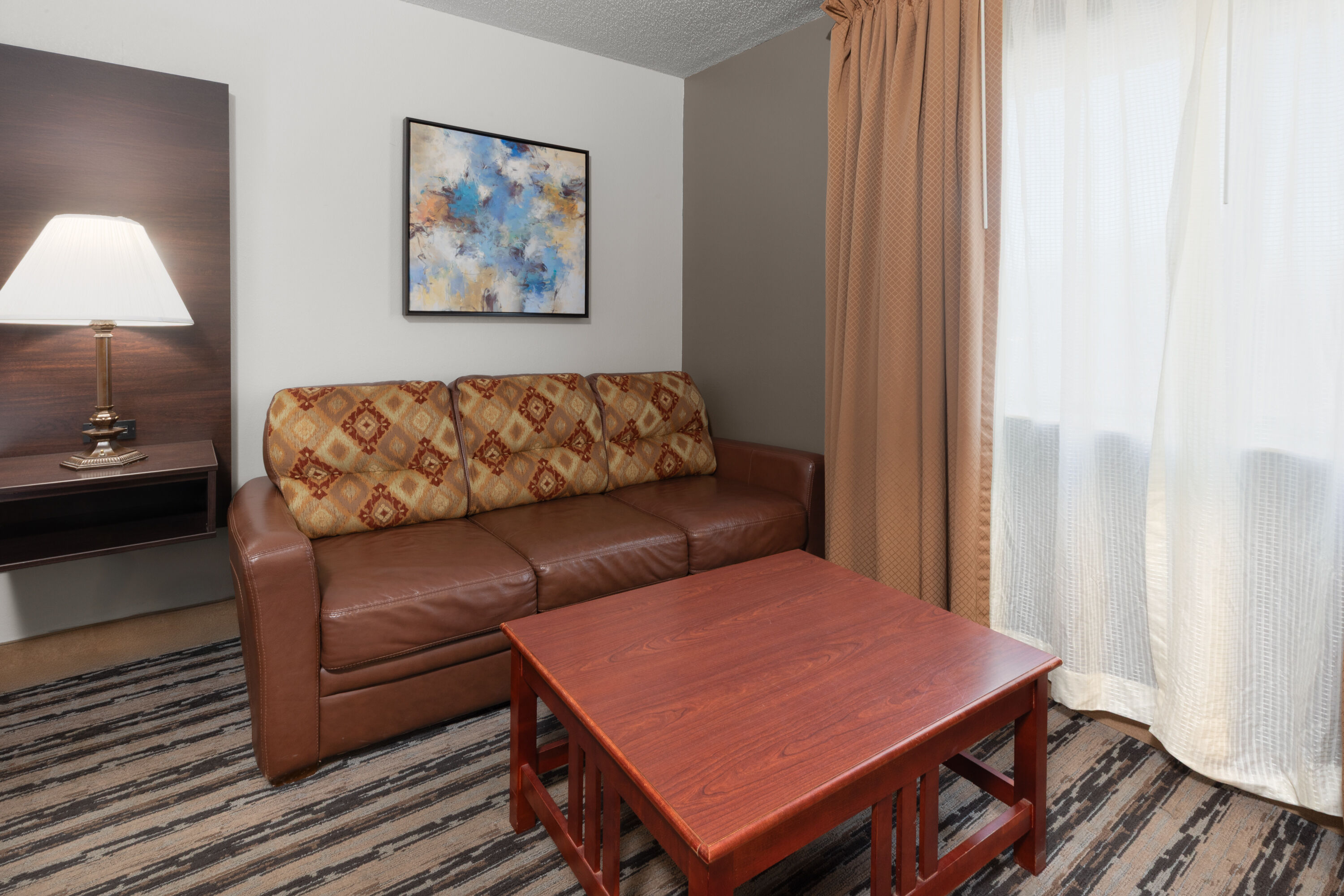 Guest room at the Endeavor Inn & Suites, Trademark Collection by Wyndham in Topeka, Kansas