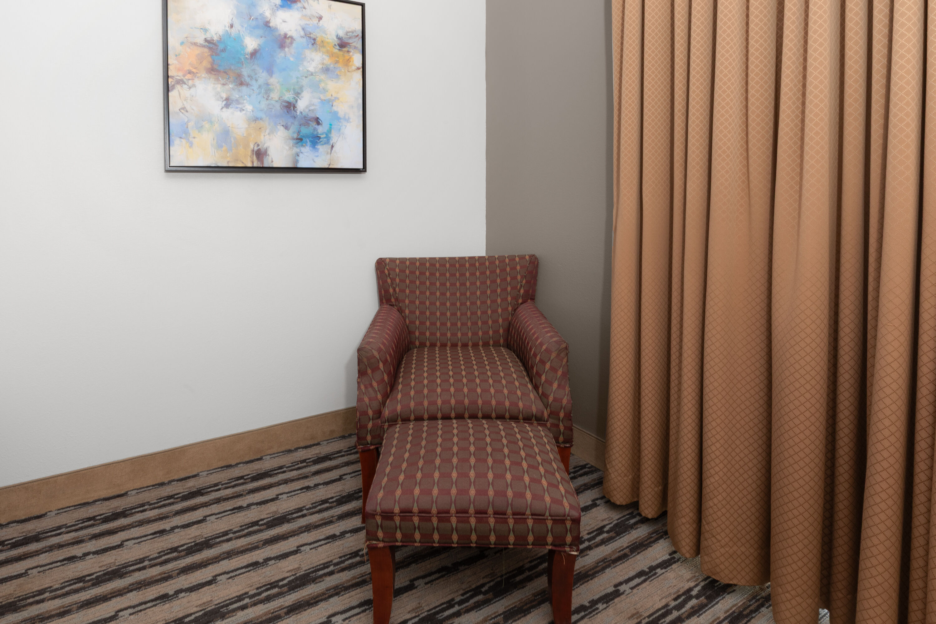 Guest room at the Endeavor Inn & Suites, Trademark Collection by Wyndham in Topeka, Kansas