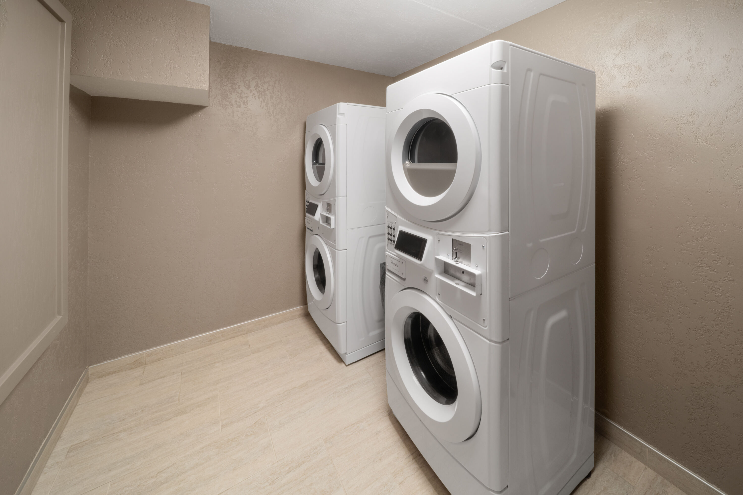 Laundry facilities at Endeavor Inn & Suites, Trademark Collection by Wyndham in Topeka, Kansas