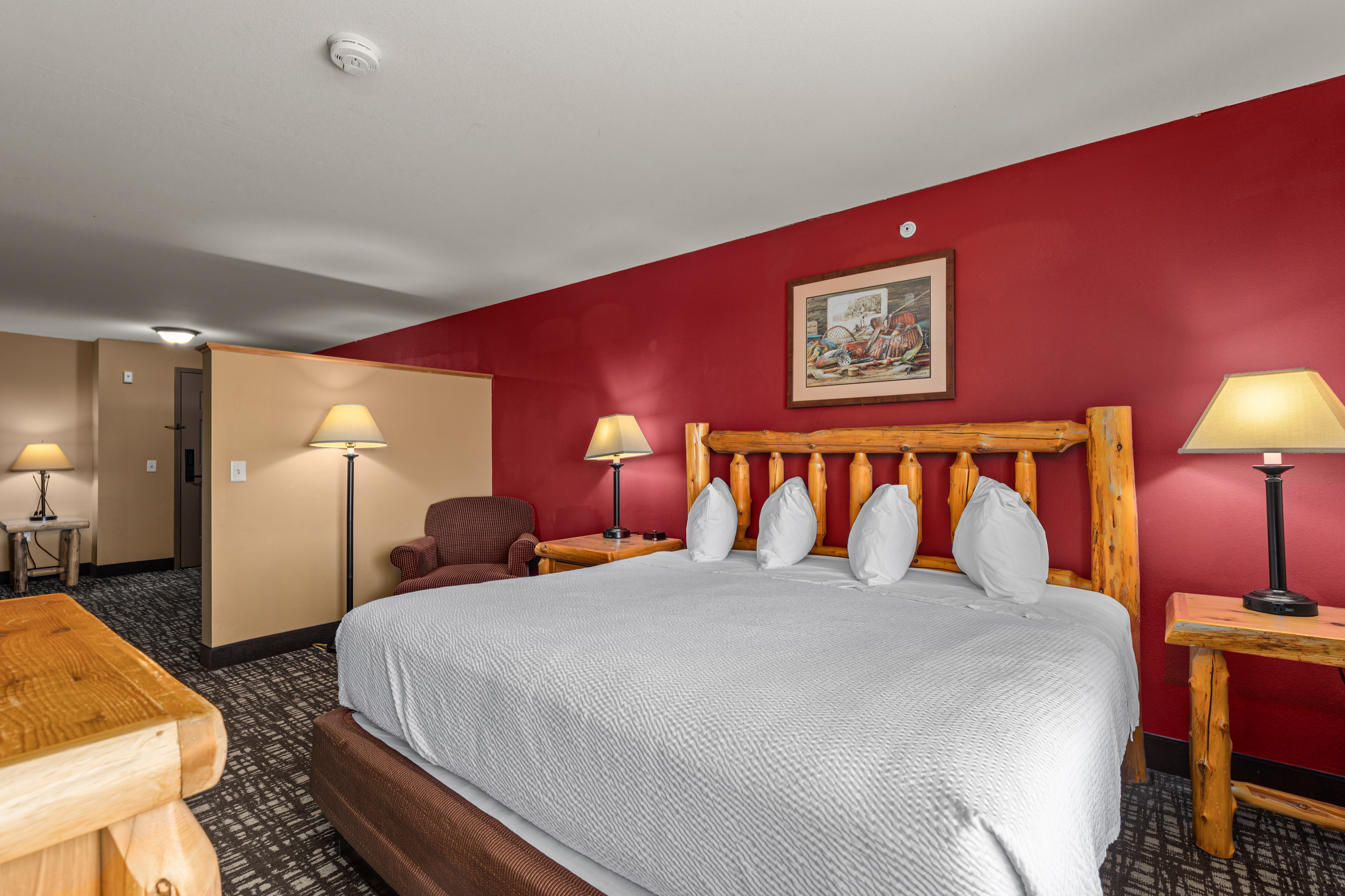 King bed guest room at the The Lodge at Brainerd Lakes, Trademark Collection by Wyndham in Baxter, Minnesota