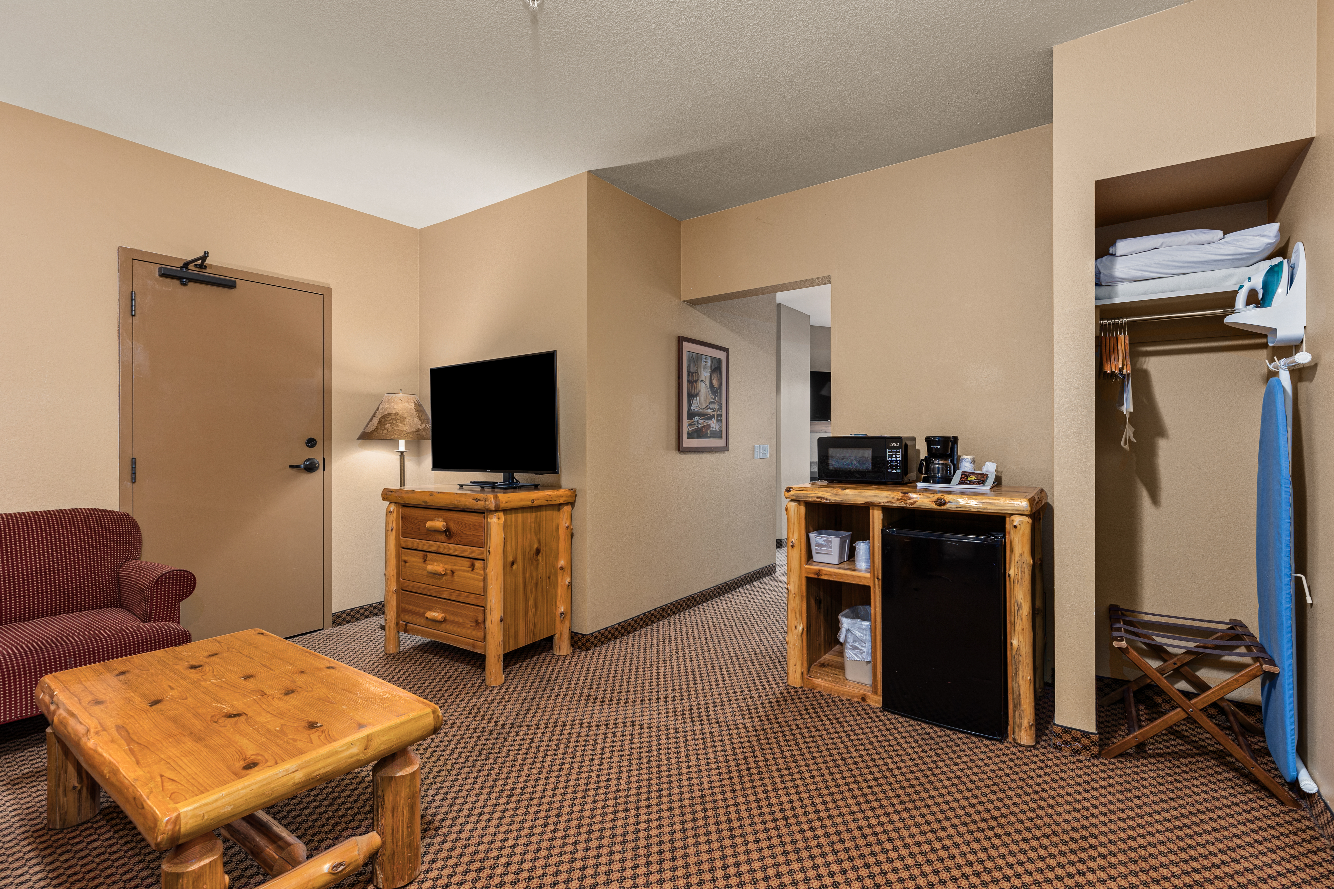 King bed guest room at the The Lodge at Brainerd Lakes, Trademark Collection by Wyndham in Baxter, Minnesota