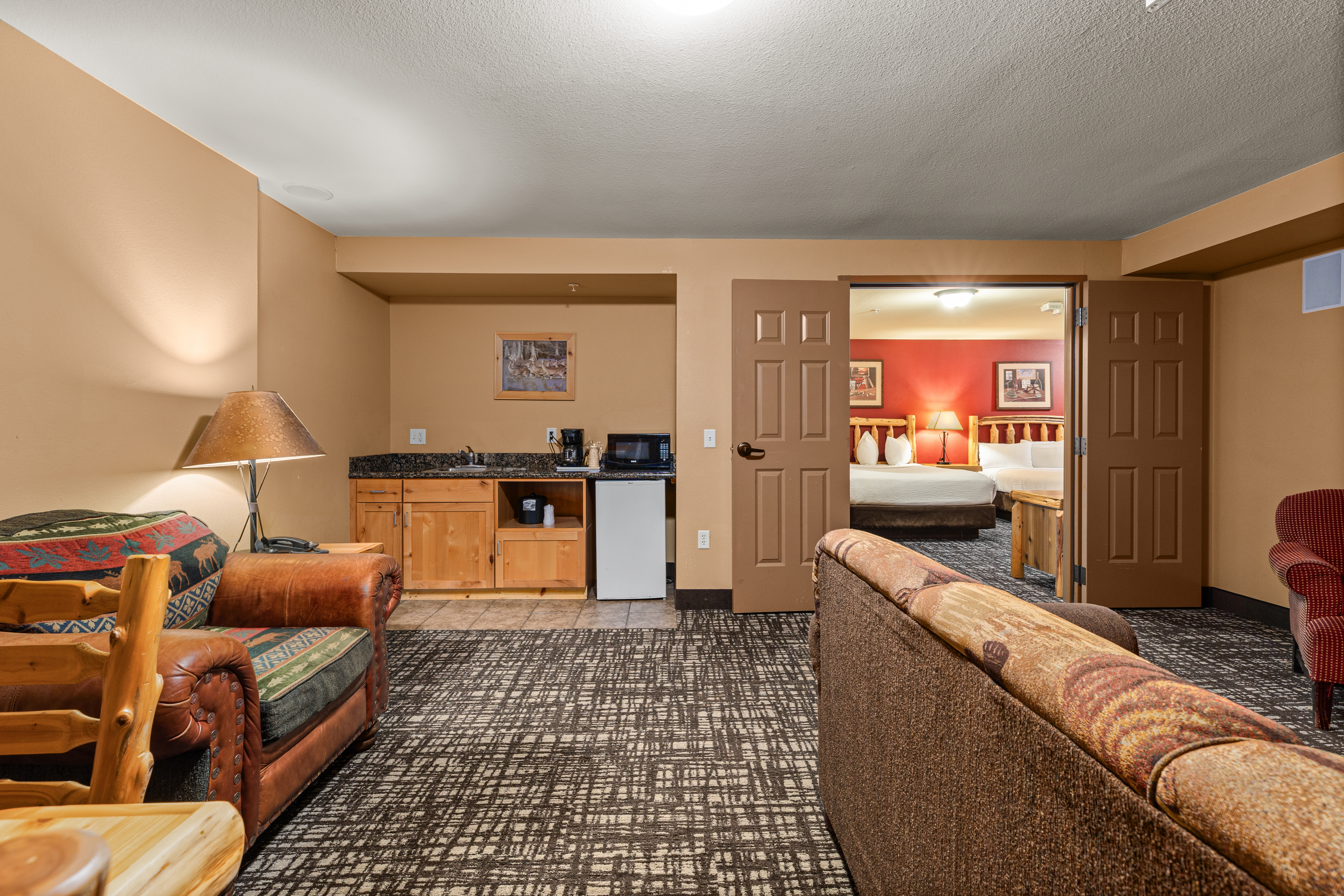 King bed guest room at the The Lodge at Brainerd Lakes, Trademark Collection by Wyndham in Baxter, Minnesota