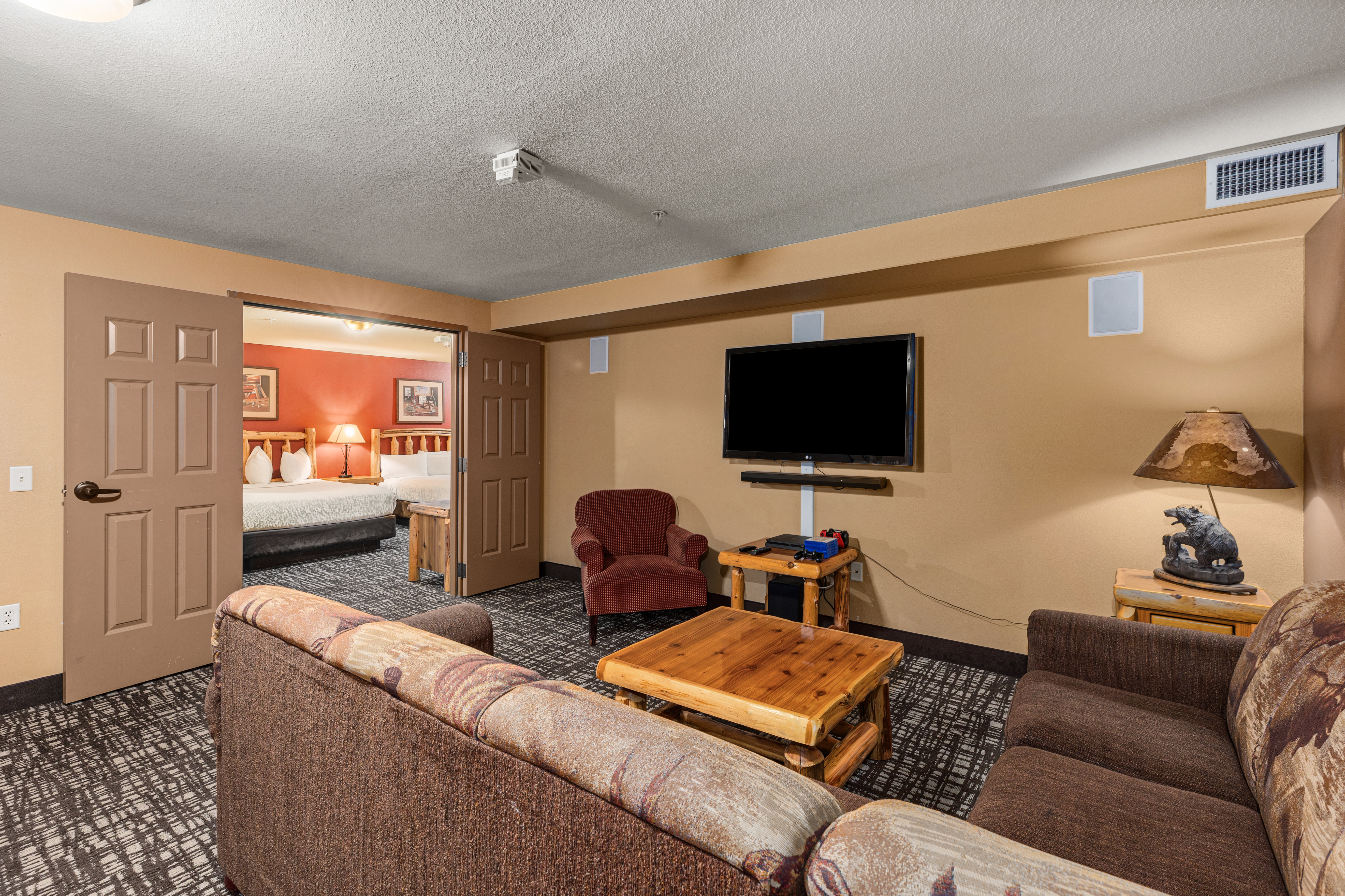 King bed guest room at the The Lodge at Brainerd Lakes, Trademark Collection by Wyndham in Baxter, Minnesota