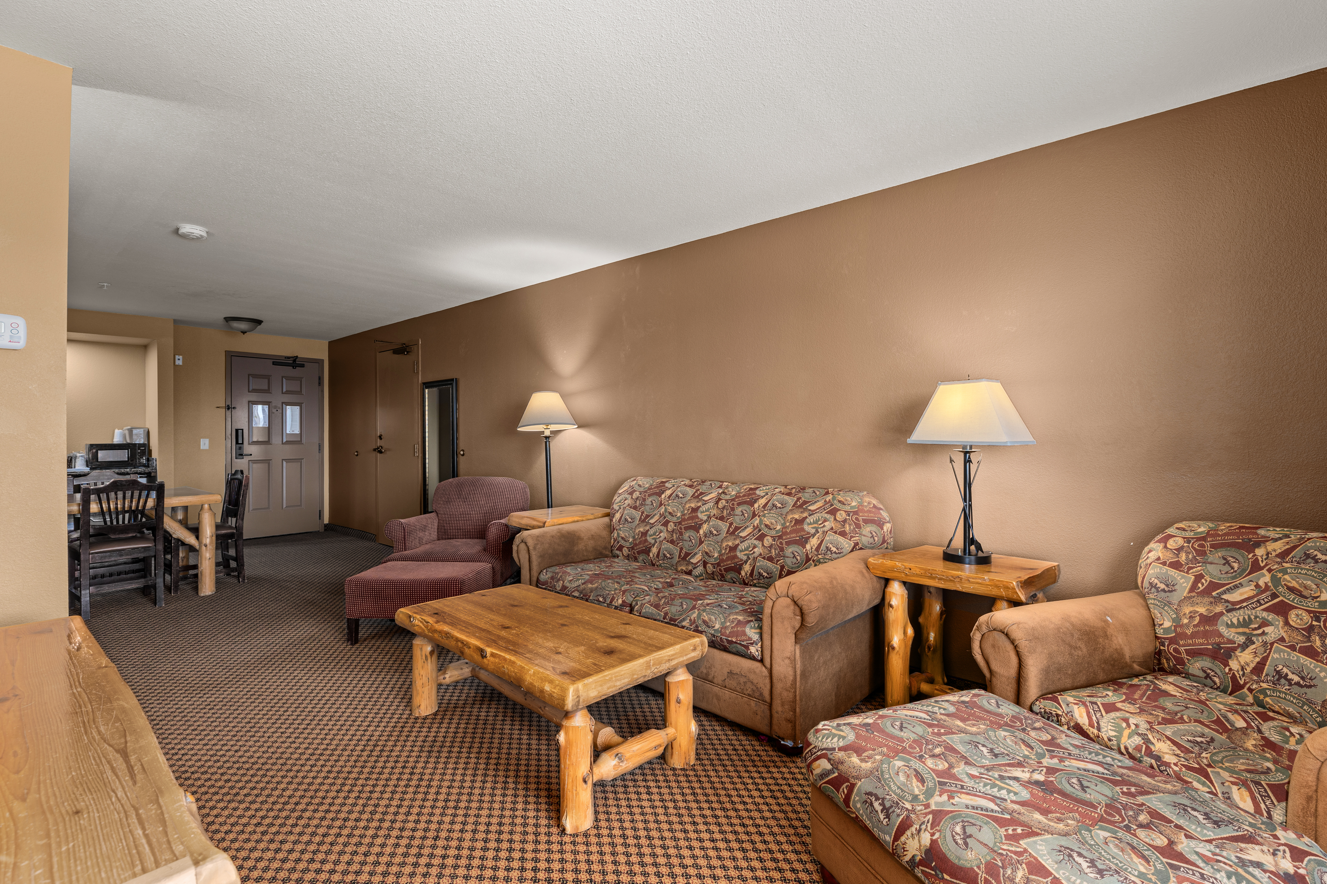 King bed guest room at the The Lodge at Brainerd Lakes, Trademark Collection by Wyndham in Baxter, Minnesota