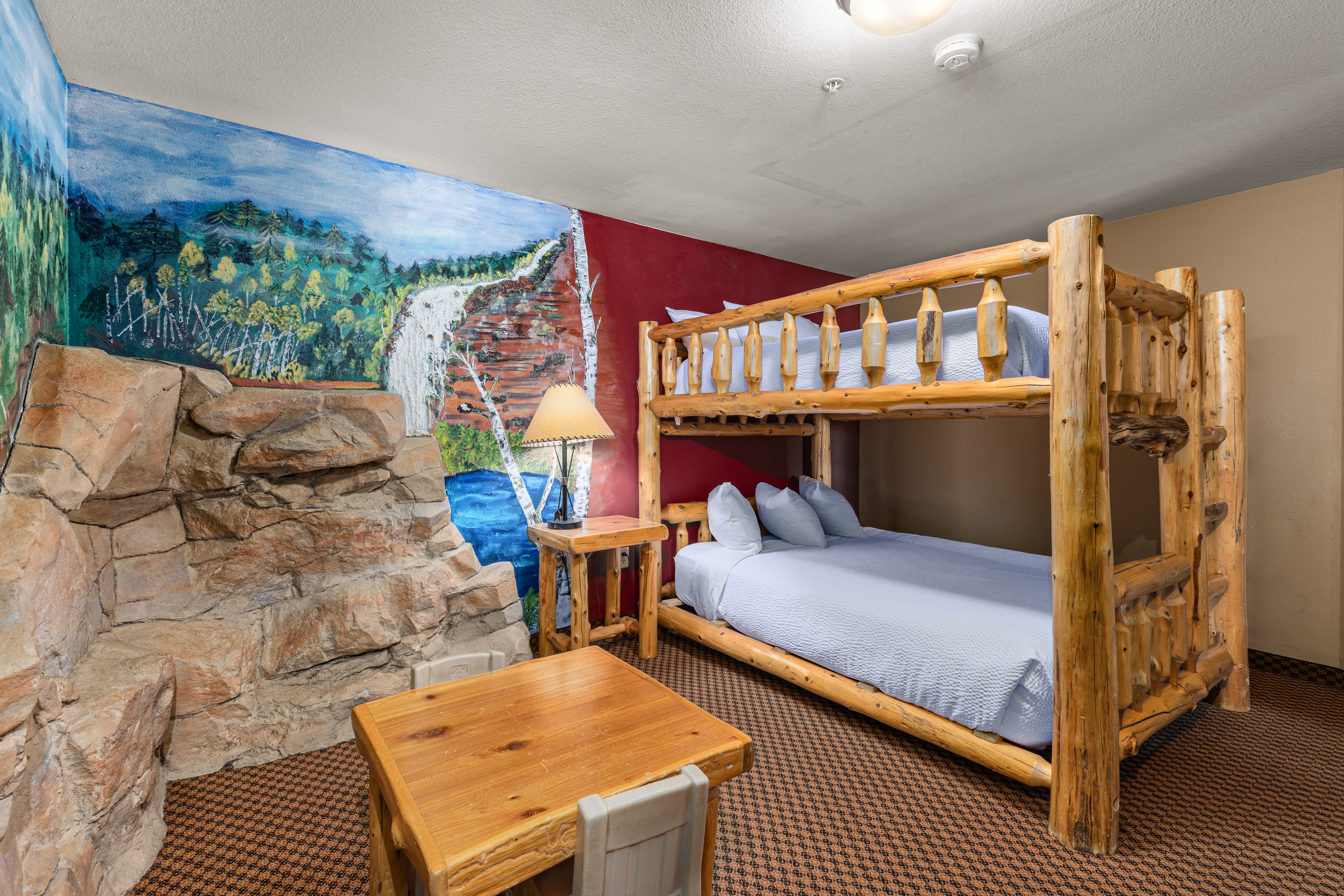 King bed guest room at the The Lodge at Brainerd Lakes, Trademark Collection by Wyndham in Baxter, Minnesota