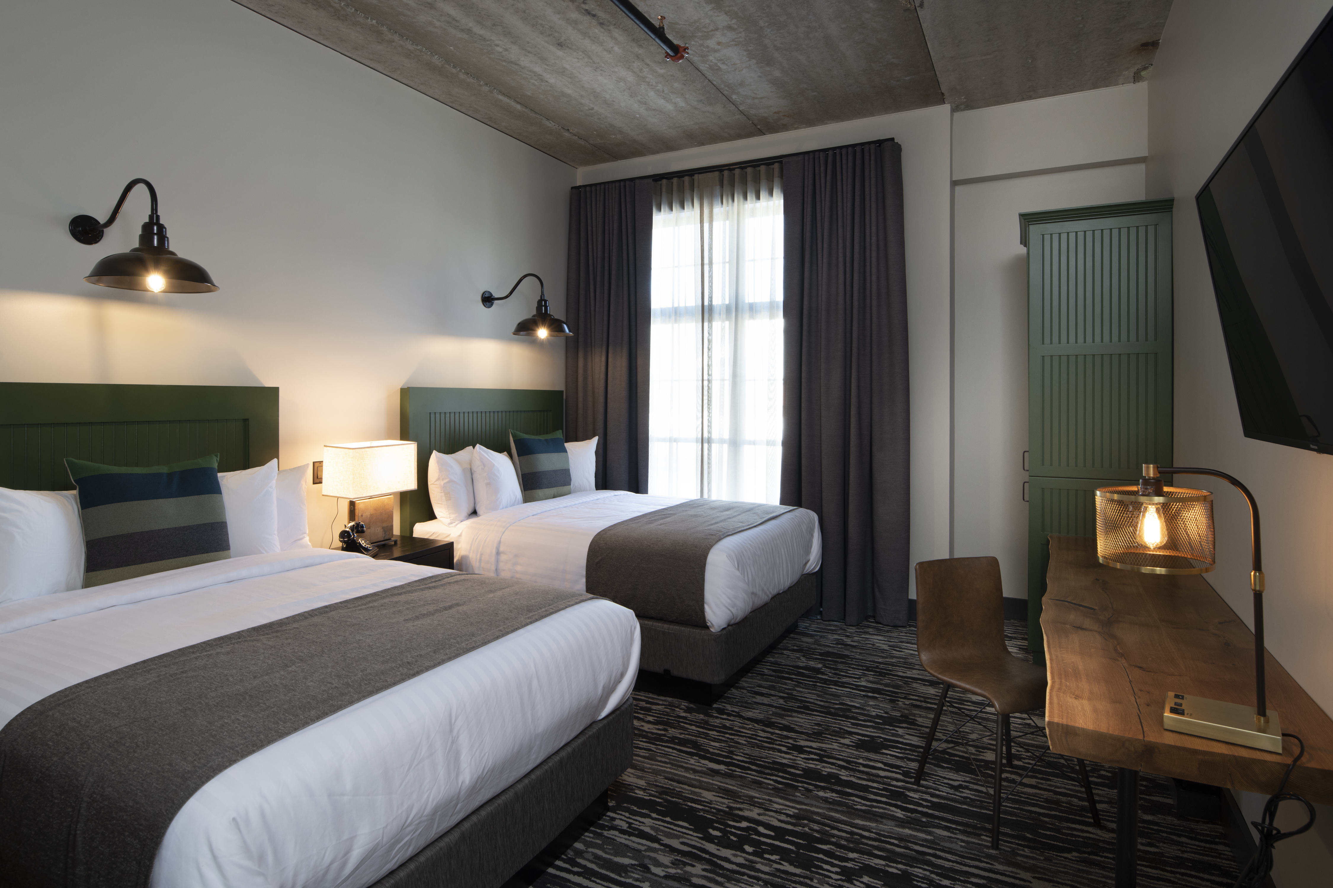 Guest room at the Cantilever Hotel, Trademark Collection by Wyndham in Ranier, Minnesota