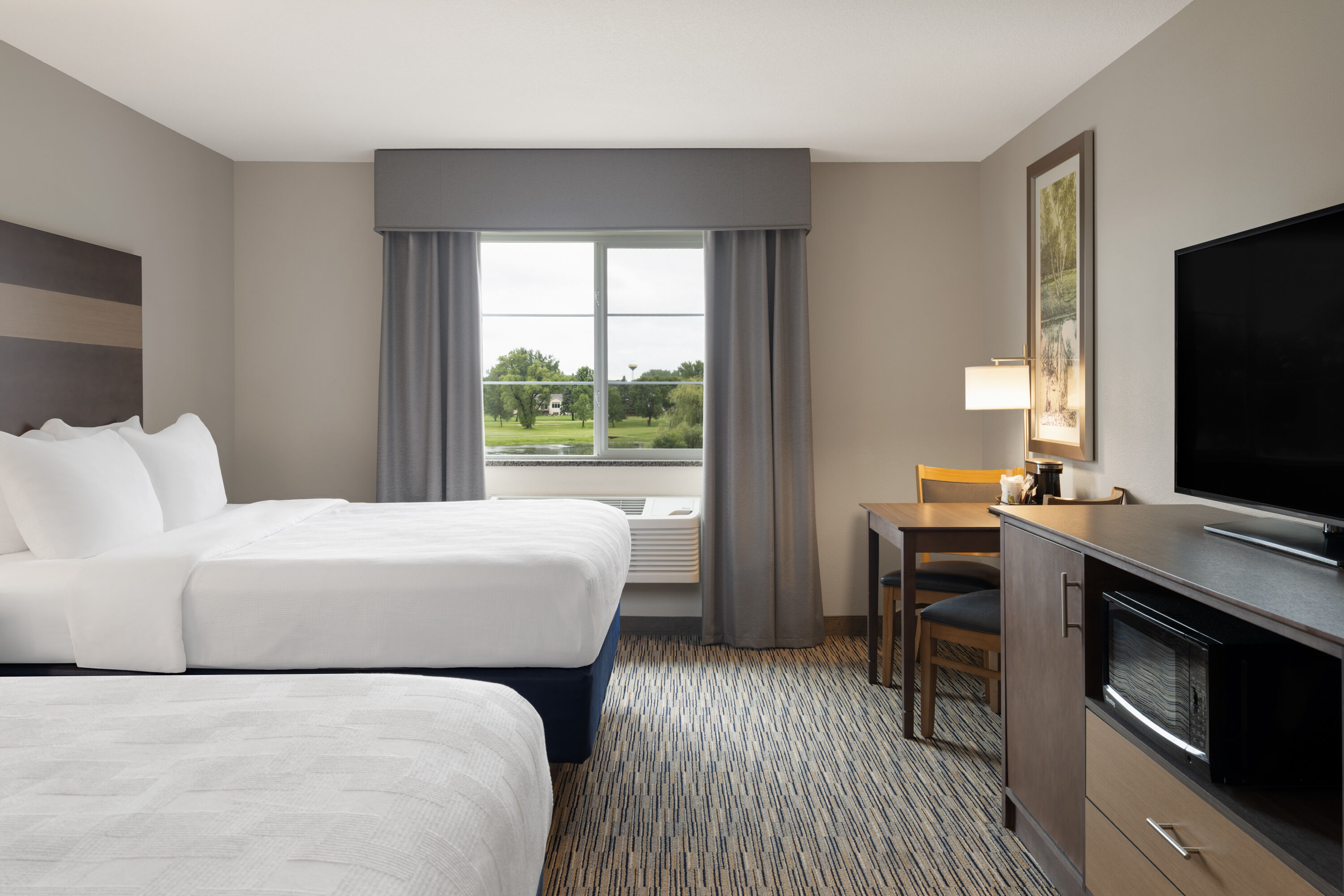 Guest room at the Little Crow Resort & Conference, Trademark by Wyndham in Spicer, Minnesota