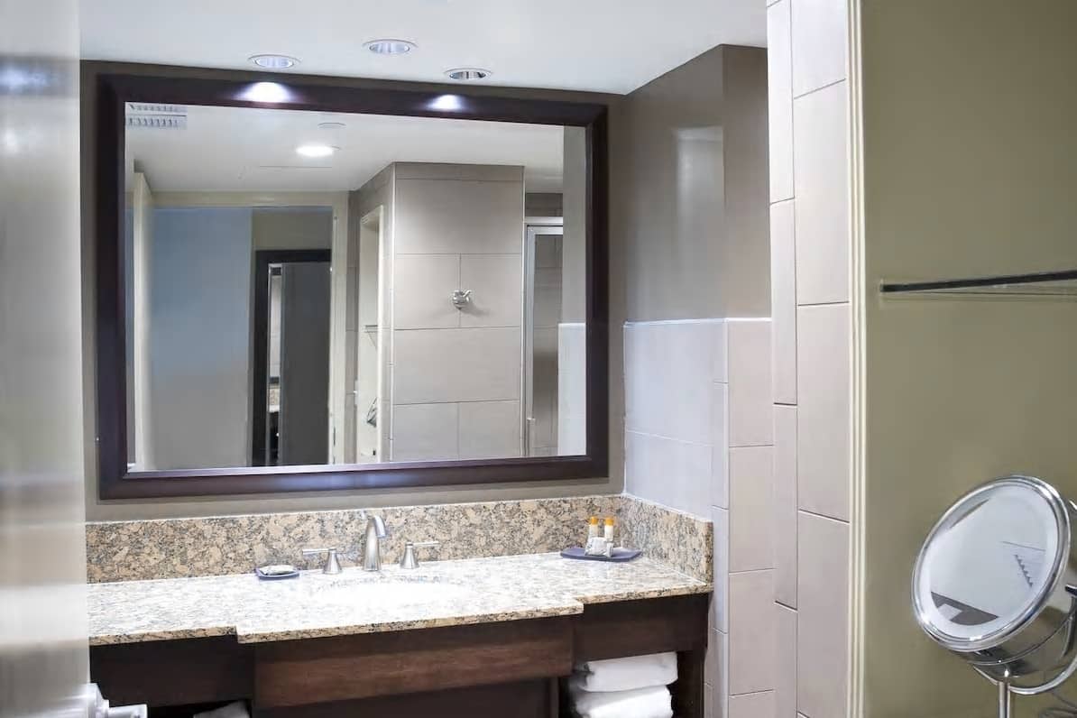 Guest room bath at the Isle of Capri Casino Hotel Boonville, Trademark Collection in Boonville, Missouri