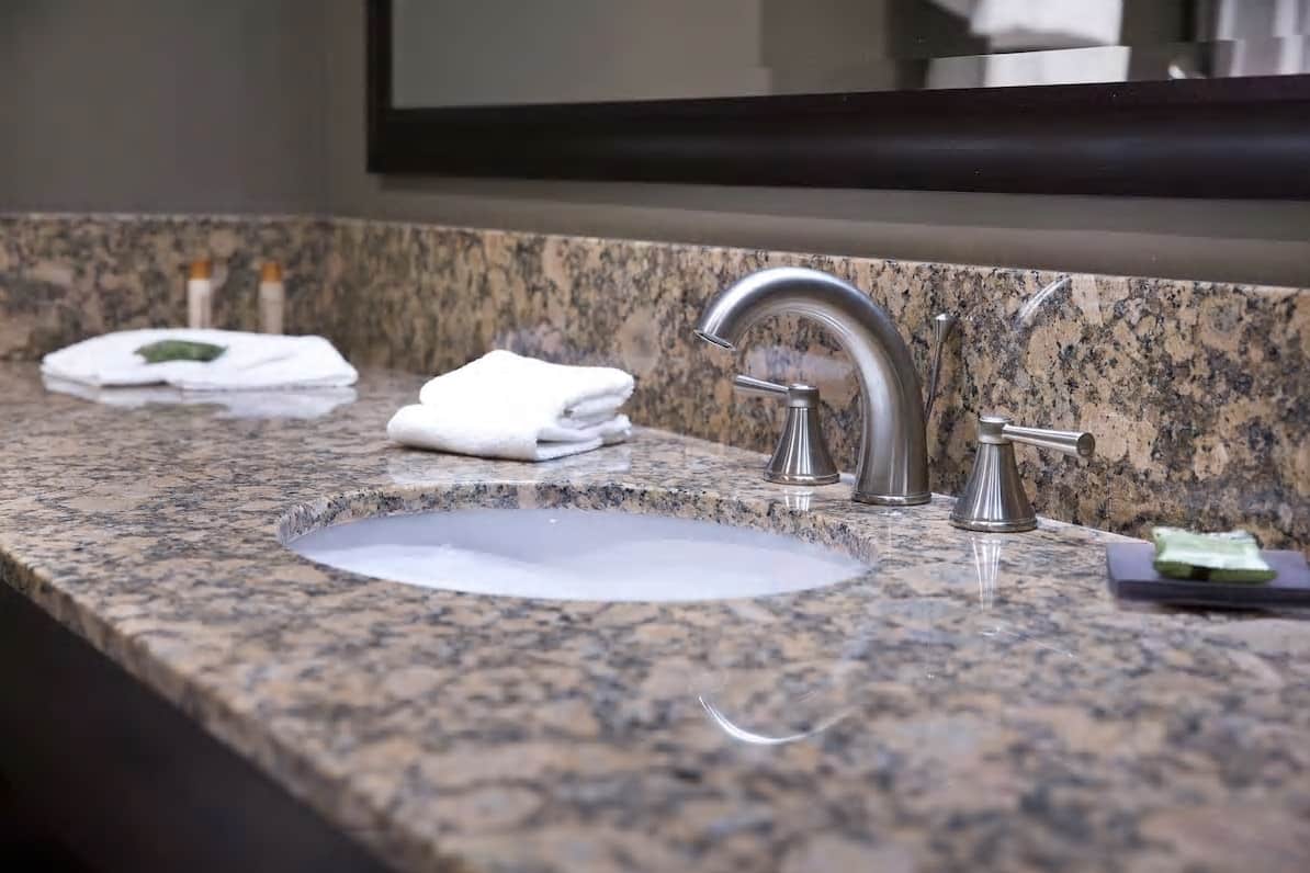 Guest room bath at the Isle of Capri Casino Hotel Boonville, Trademark Collection in Boonville, Missouri