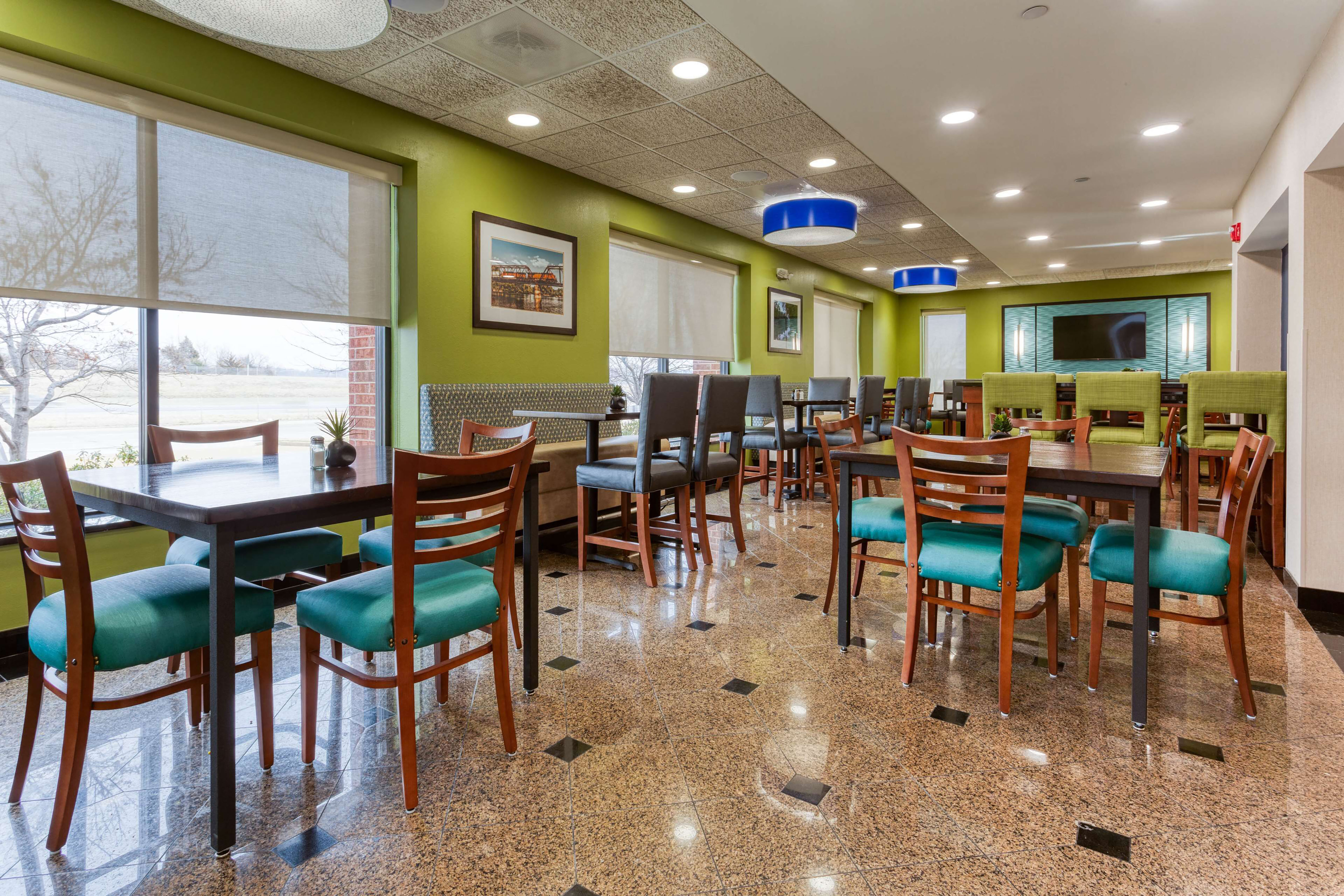 Heritage Inn & Suites St. Louis/Fenton, Trademark by Wyndham restaurant breakfast area with seating in Fenton, Missouri