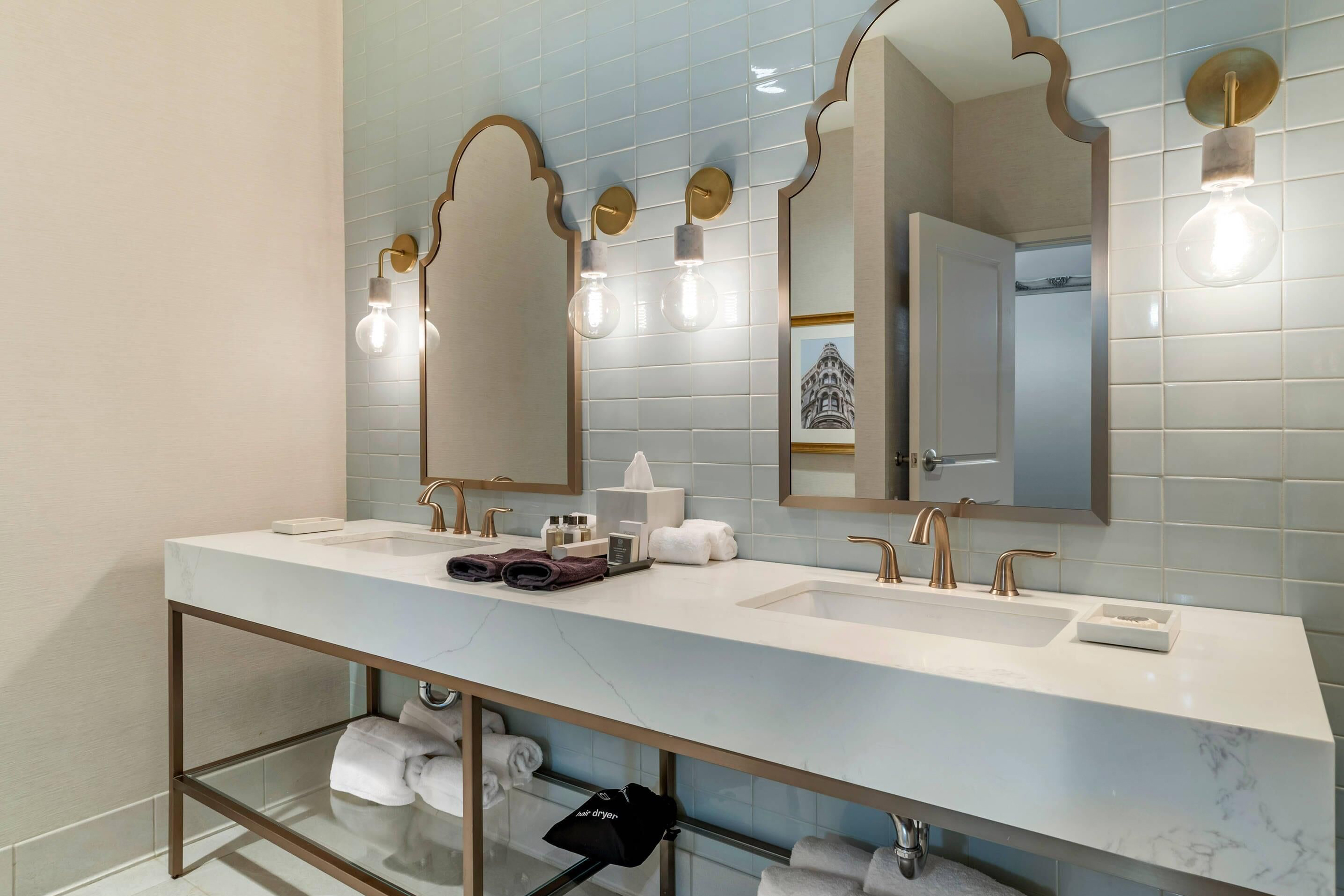 Guest room bath at the Lyric Hotel West End, Trademark Collection by Wyndham in Cleveland, Mississippi