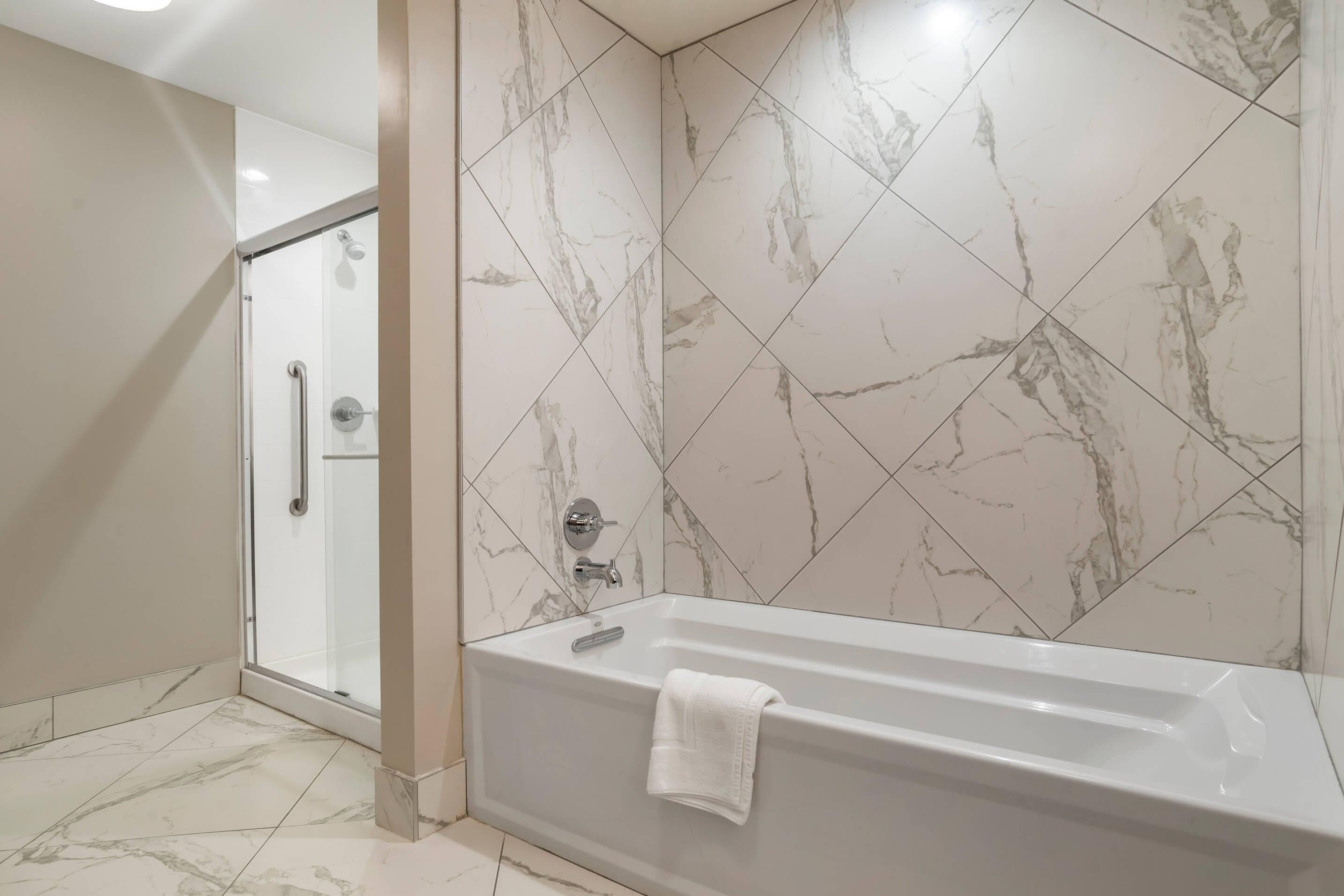 Guest room bath at the Lyric Hotel West End, Trademark Collection by Wyndham in Cleveland, Mississippi