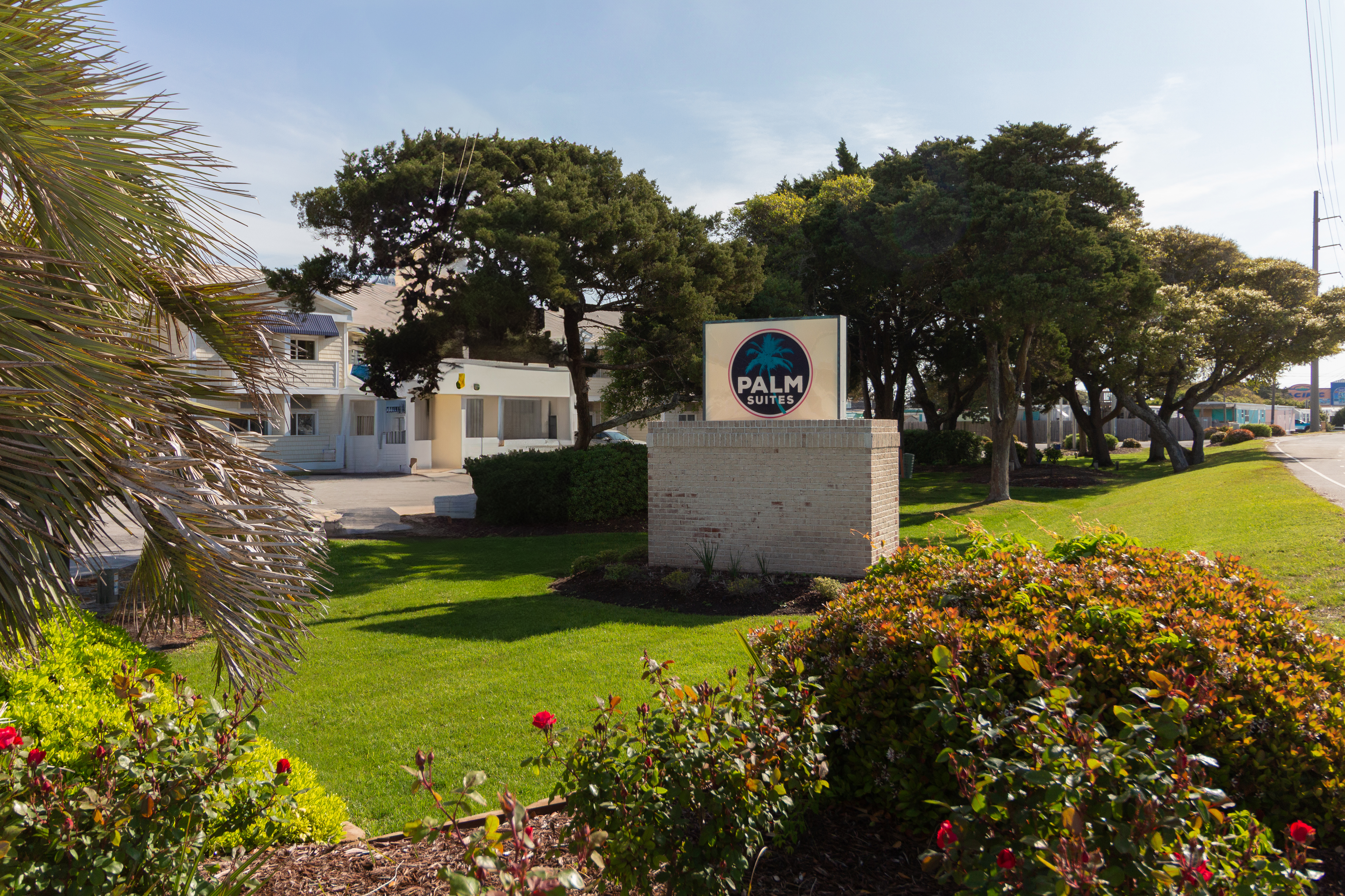 Exterior of Palm Suites Trademark Collection by Wyndham hotel in Atlantic Beach, North Carolina