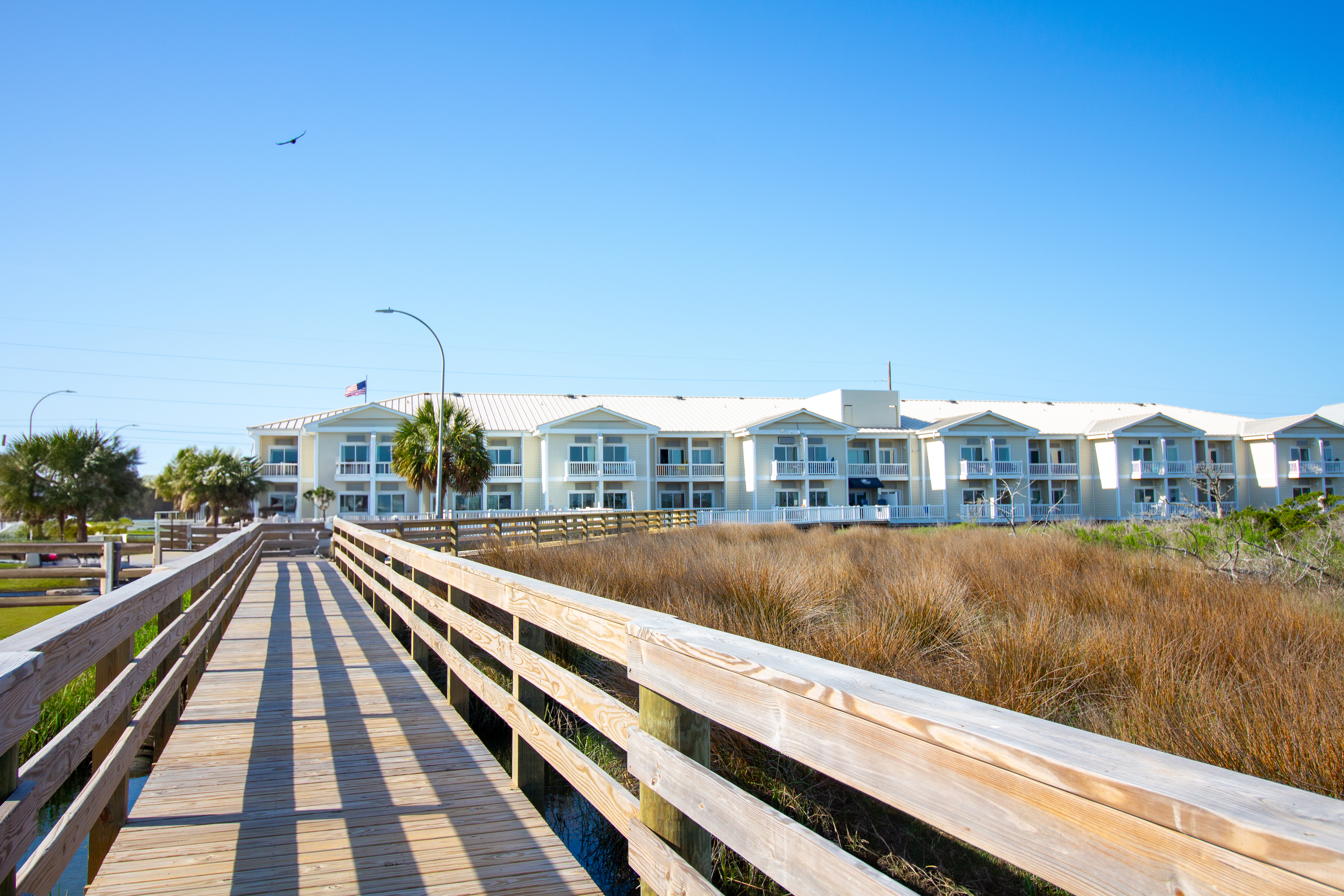 Exterior of Palm Suites Trademark Collection by Wyndham hotel in Atlantic Beach, North Carolina