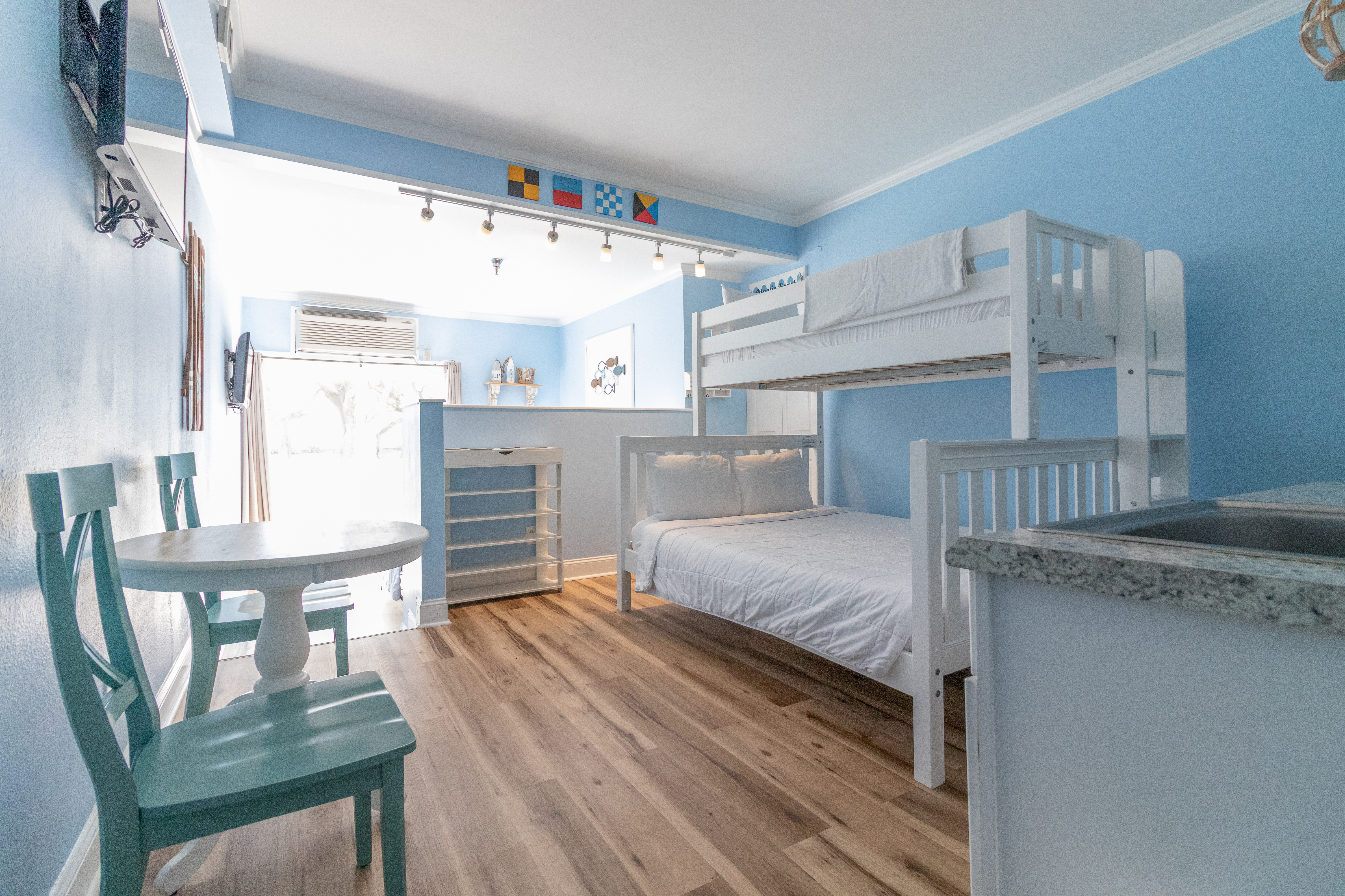 Guest room at the Palm Suites Trademark Collection by Wyndham in Atlantic Beach, North Carolina