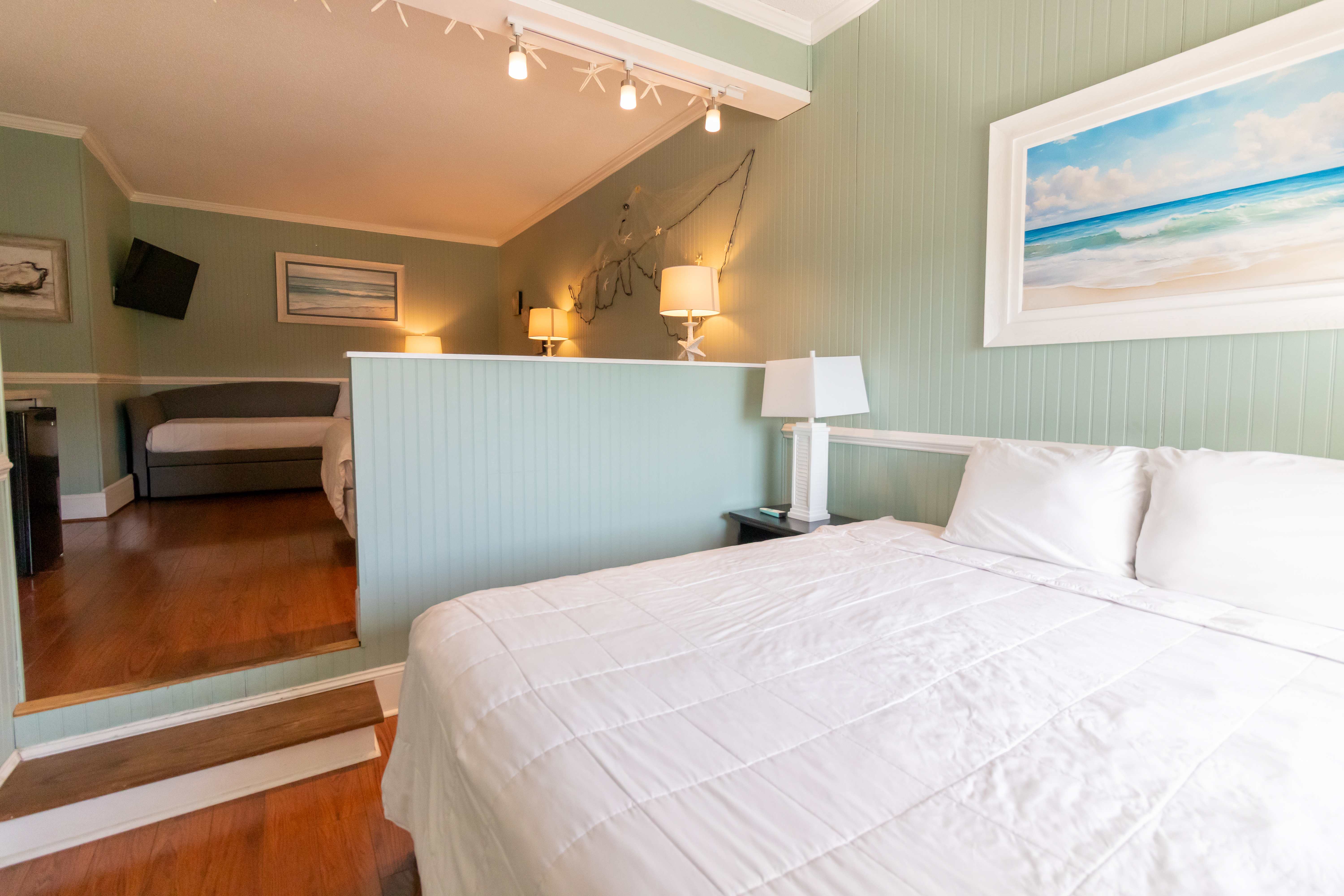 Guest room at the Palm Suites Trademark Collection by Wyndham in Atlantic Beach, North Carolina