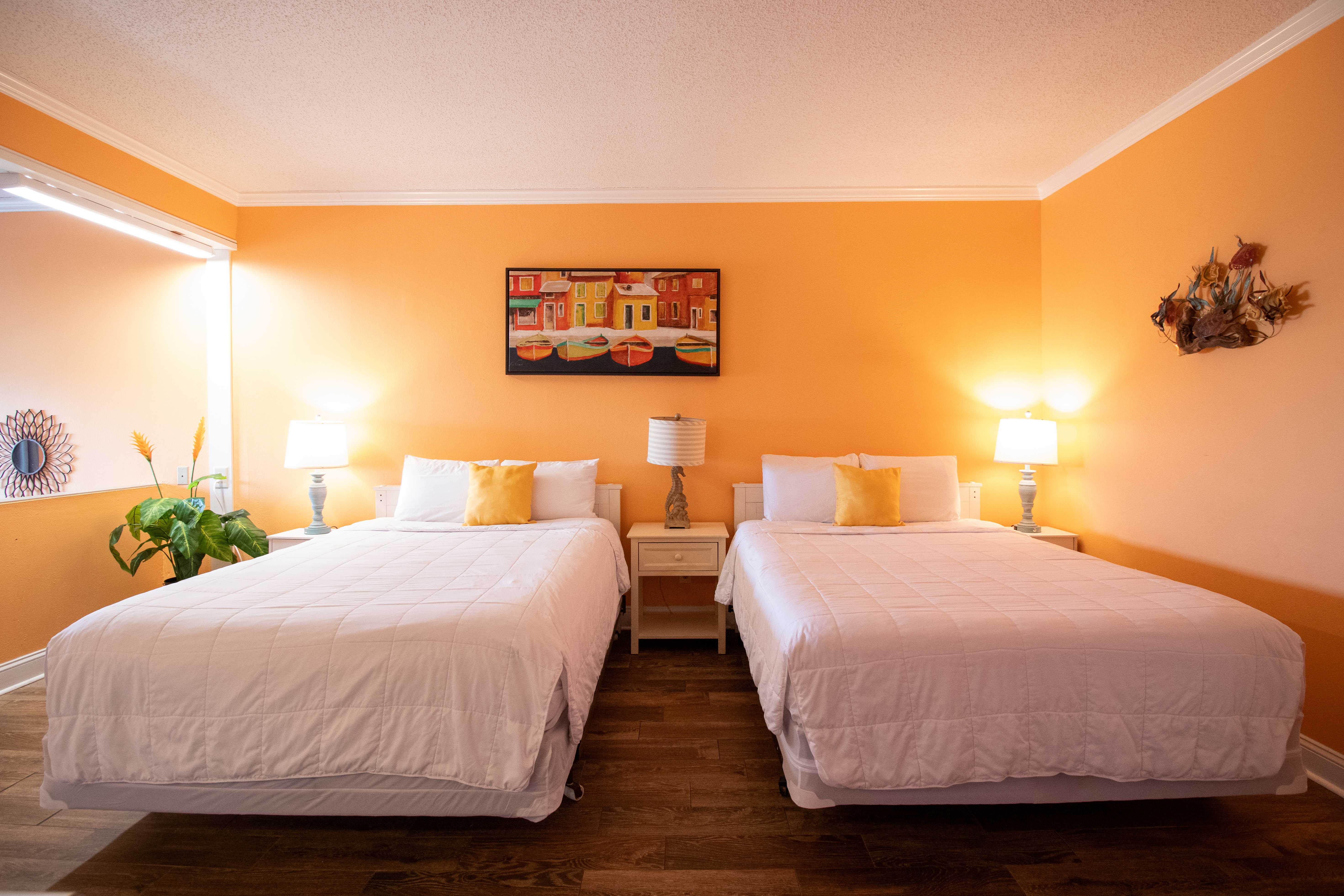 Guest room at the Palm Suites Trademark Collection by Wyndham in Atlantic Beach, North Carolina