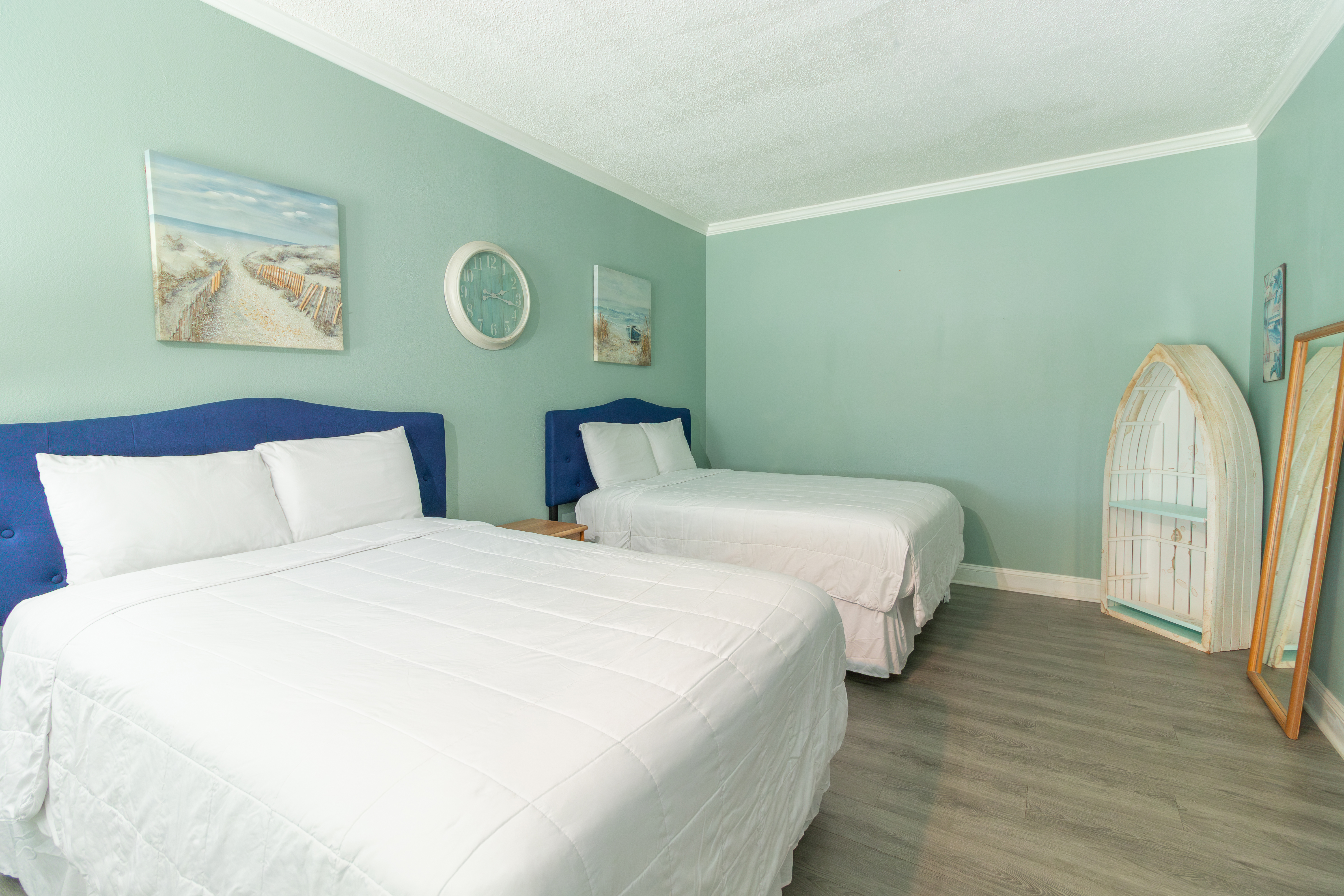 Guest room at the Palm Suites Trademark Collection by Wyndham in Atlantic Beach, North Carolina