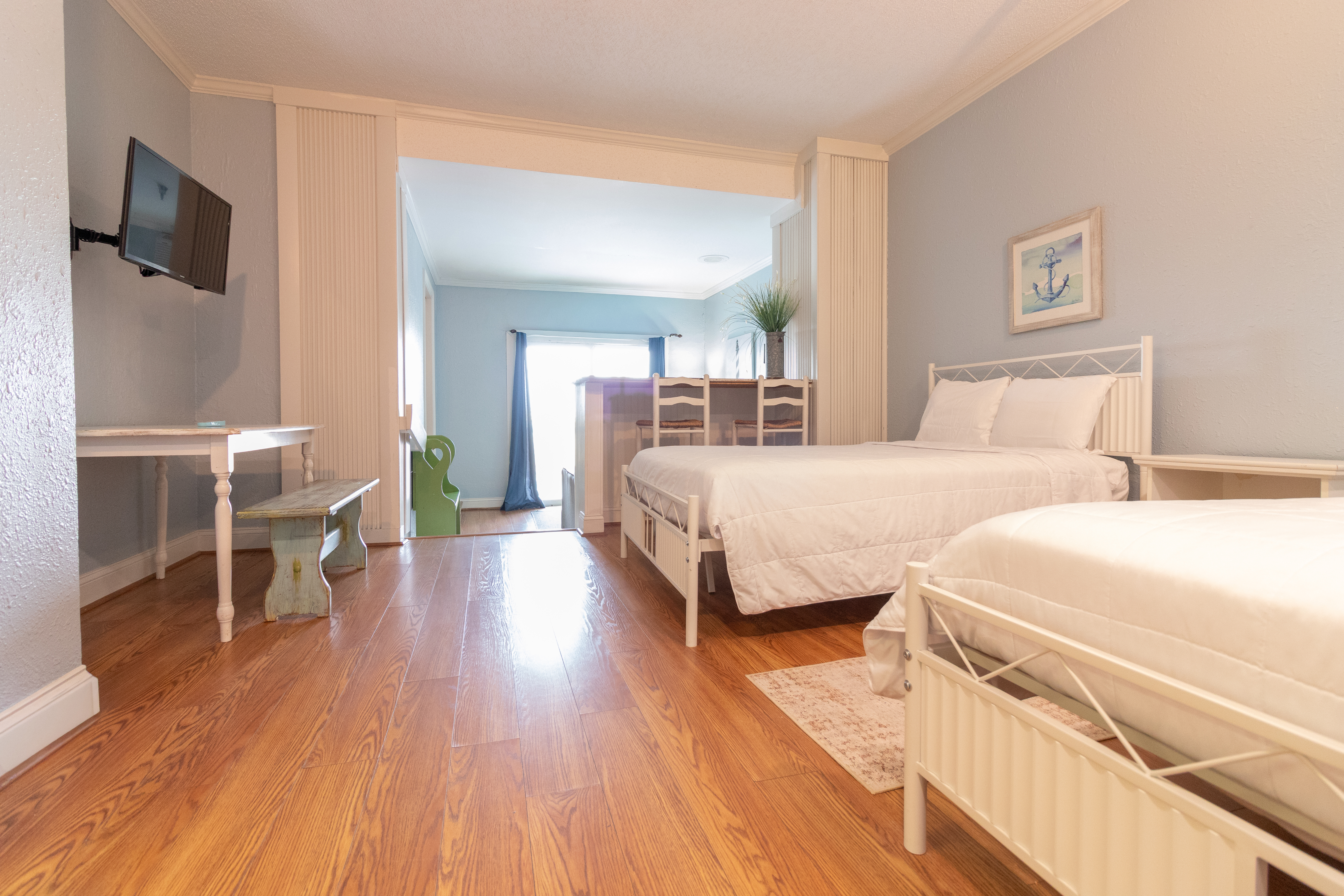 Guest room at the Palm Suites Trademark Collection by Wyndham in Atlantic Beach, North Carolina