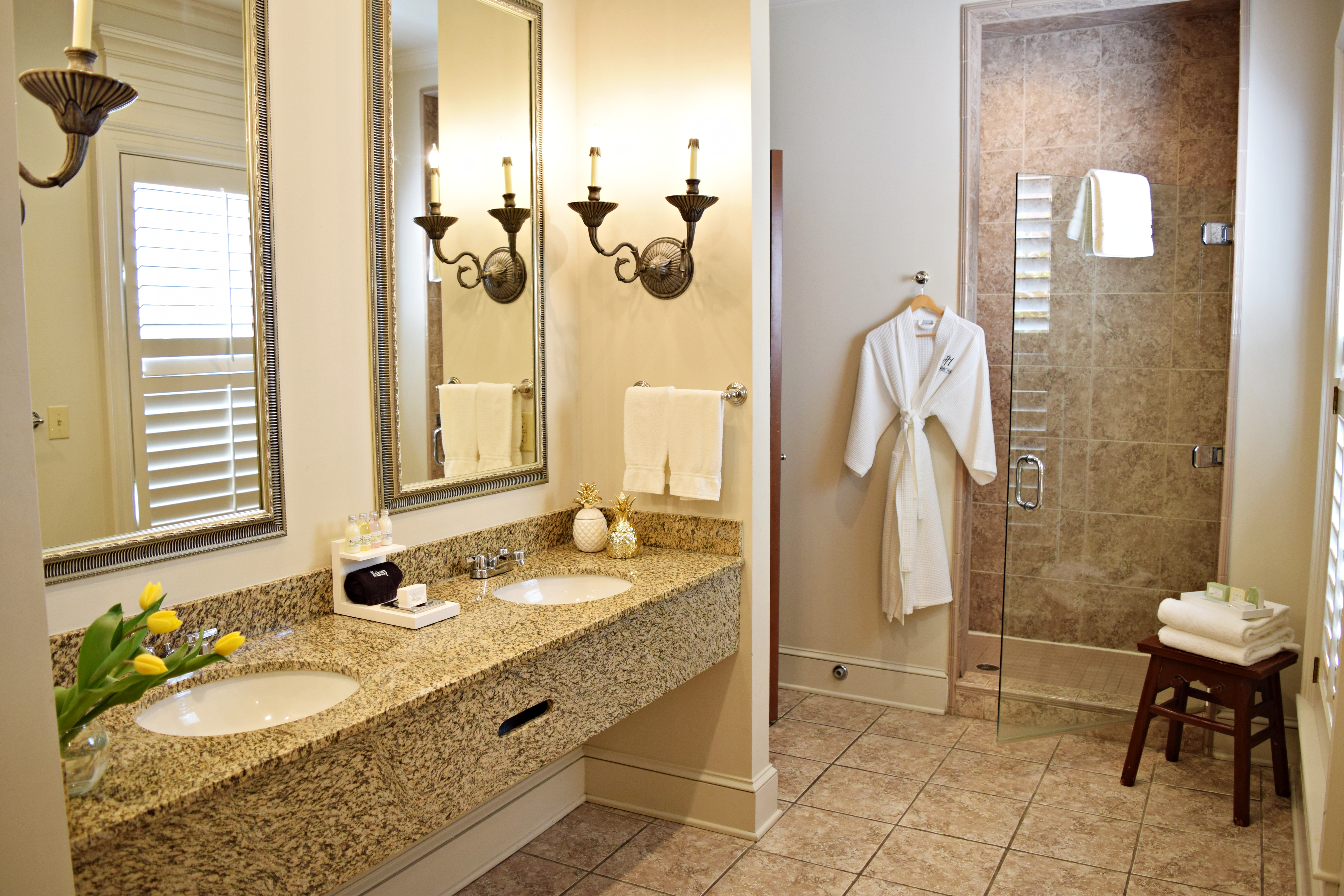Guest room bath at the JH Adams Inn, Trademark Collection by Wyndham in High Point, North Carolina