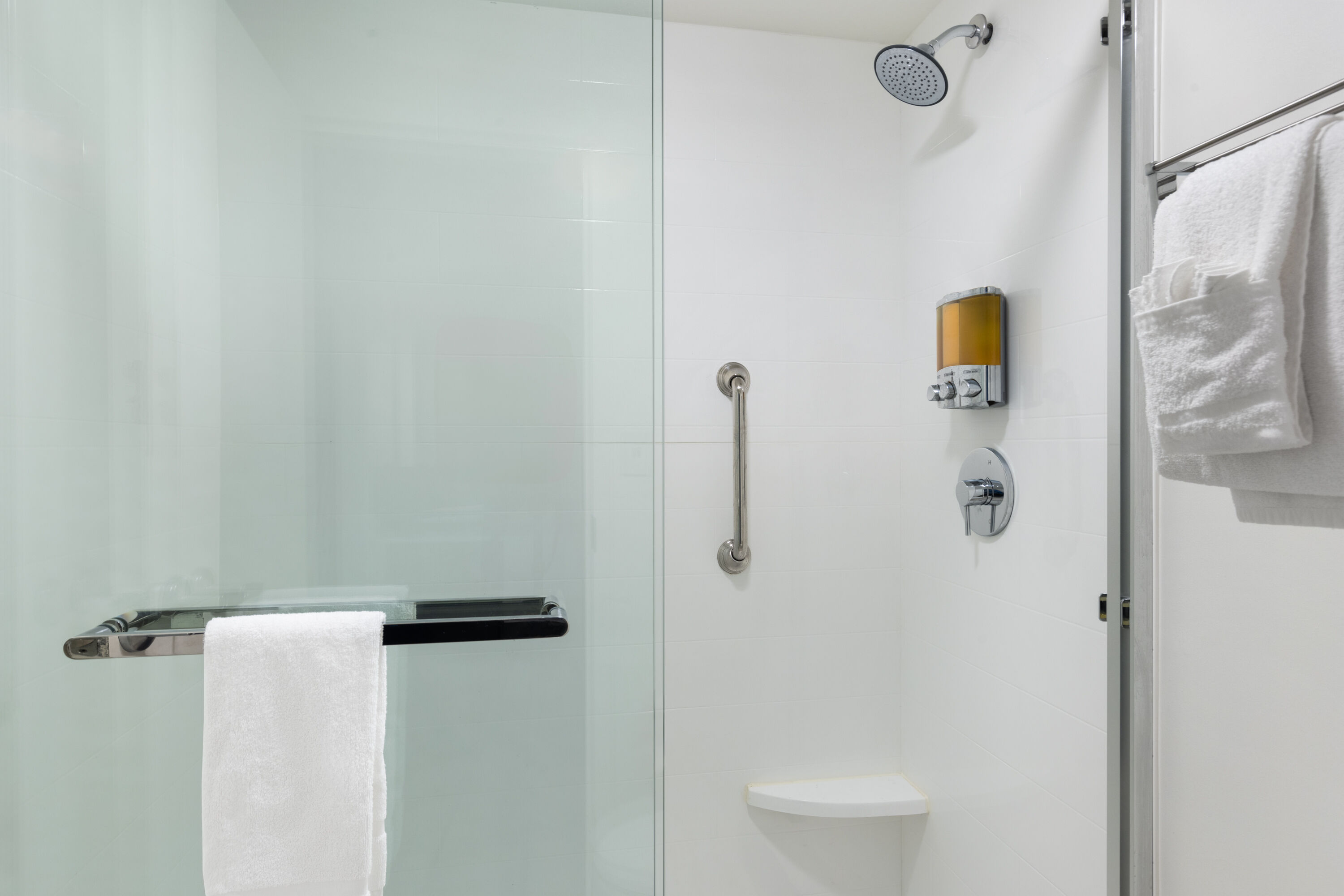 Guest room bath at the Hotel Manteo, Trademark Collection by Wyndham in Manteo, North Carolina