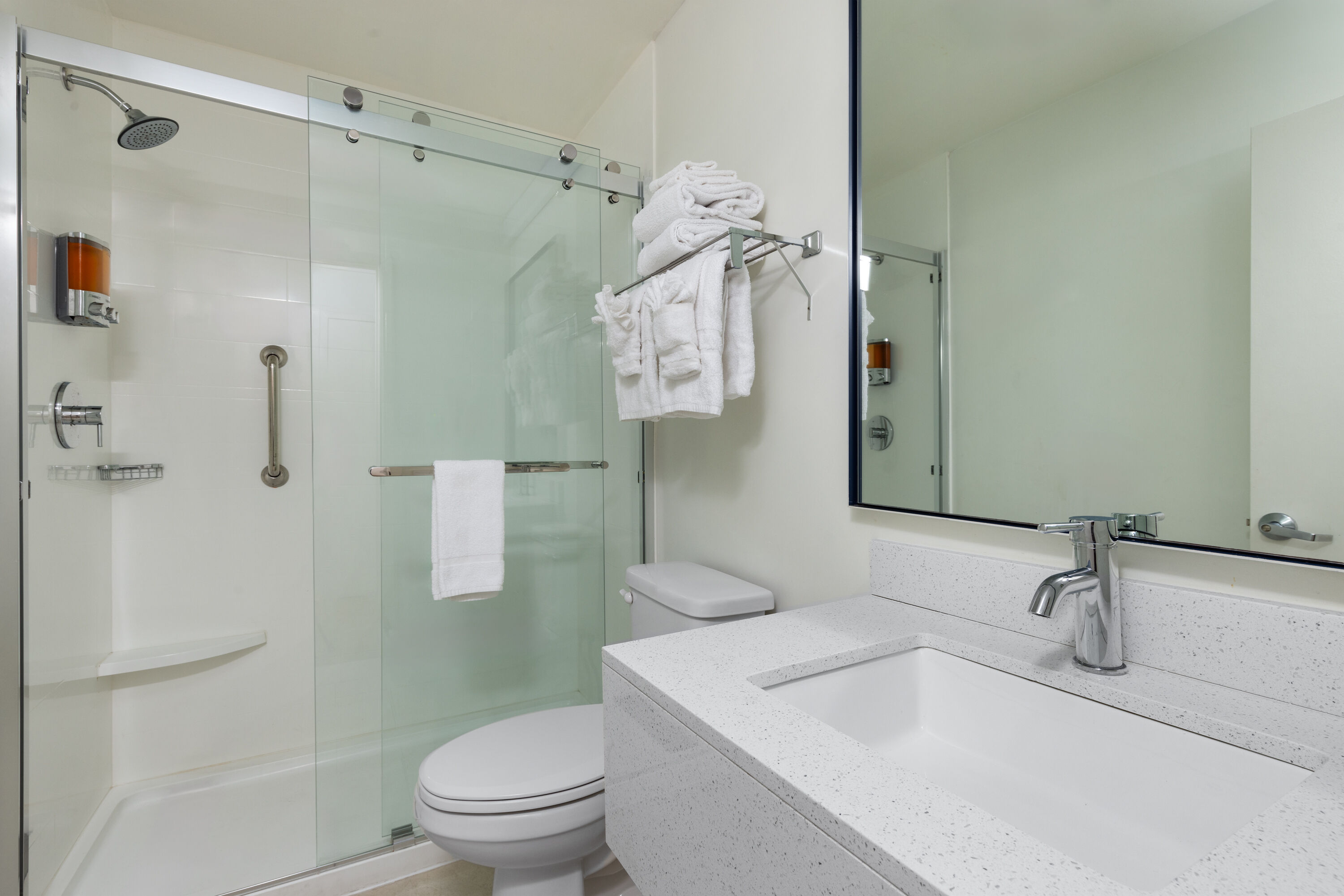 Guest room bath at the Hotel Manteo, Trademark Collection by Wyndham in Manteo, North Carolina