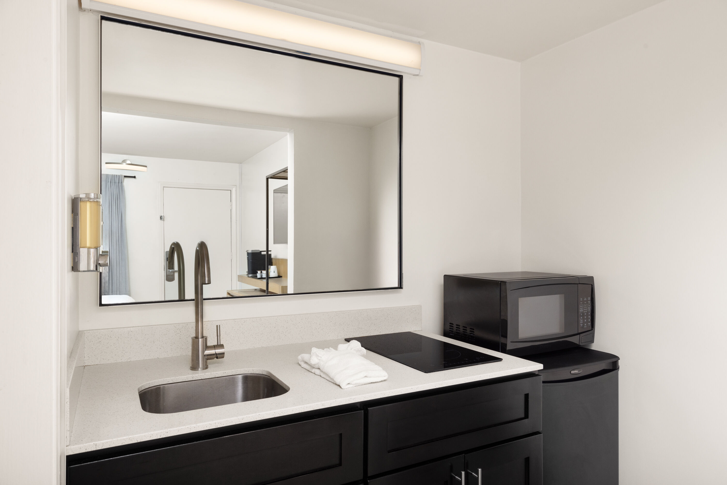 Guest room bath at the Hotel Manteo, Trademark Collection by Wyndham in Manteo, North Carolina