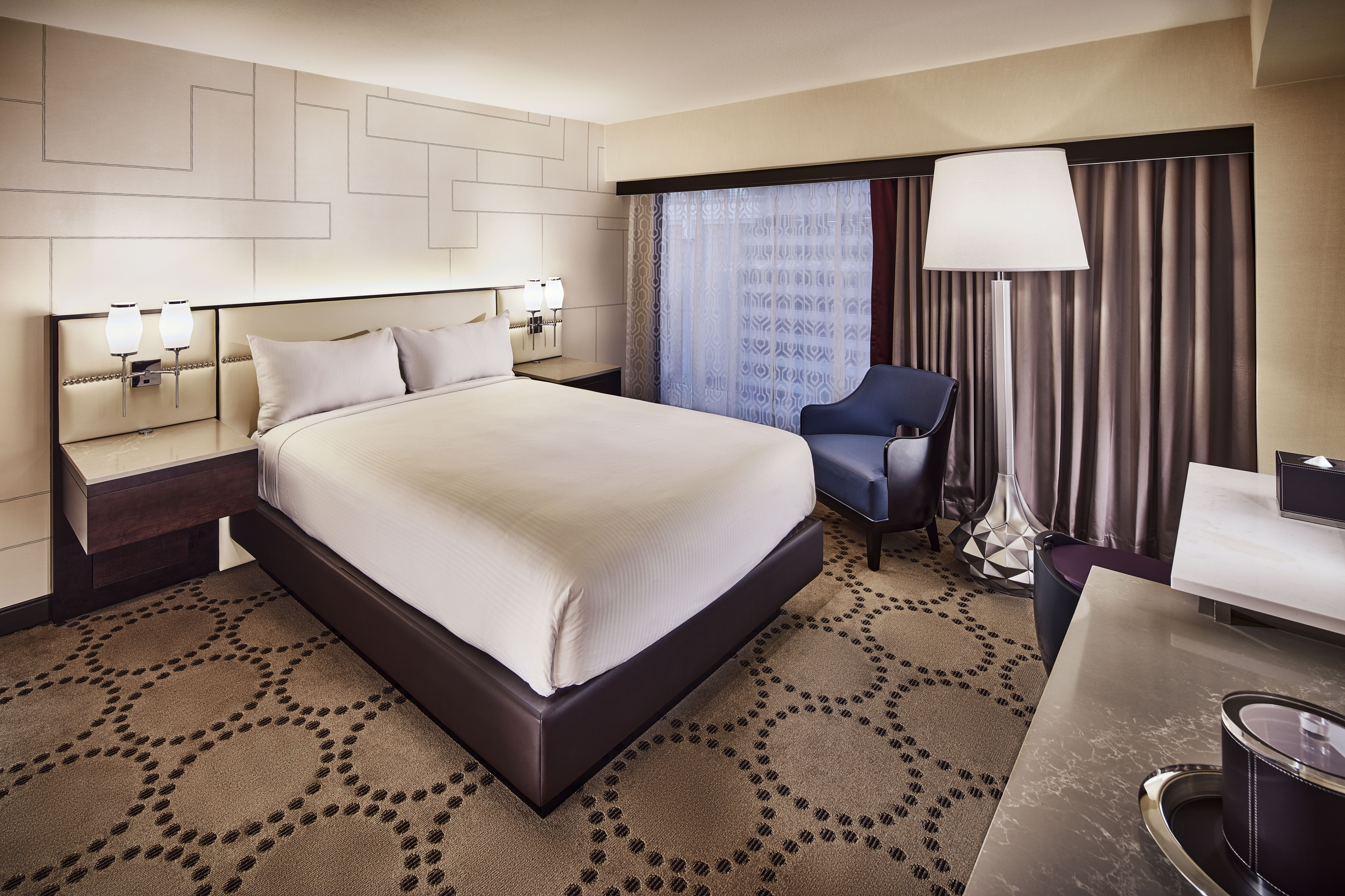 Queen bed guest room at the Harrah's Las Vegas, Trademark Collection by Wyndham in Las Vegas, Nevada