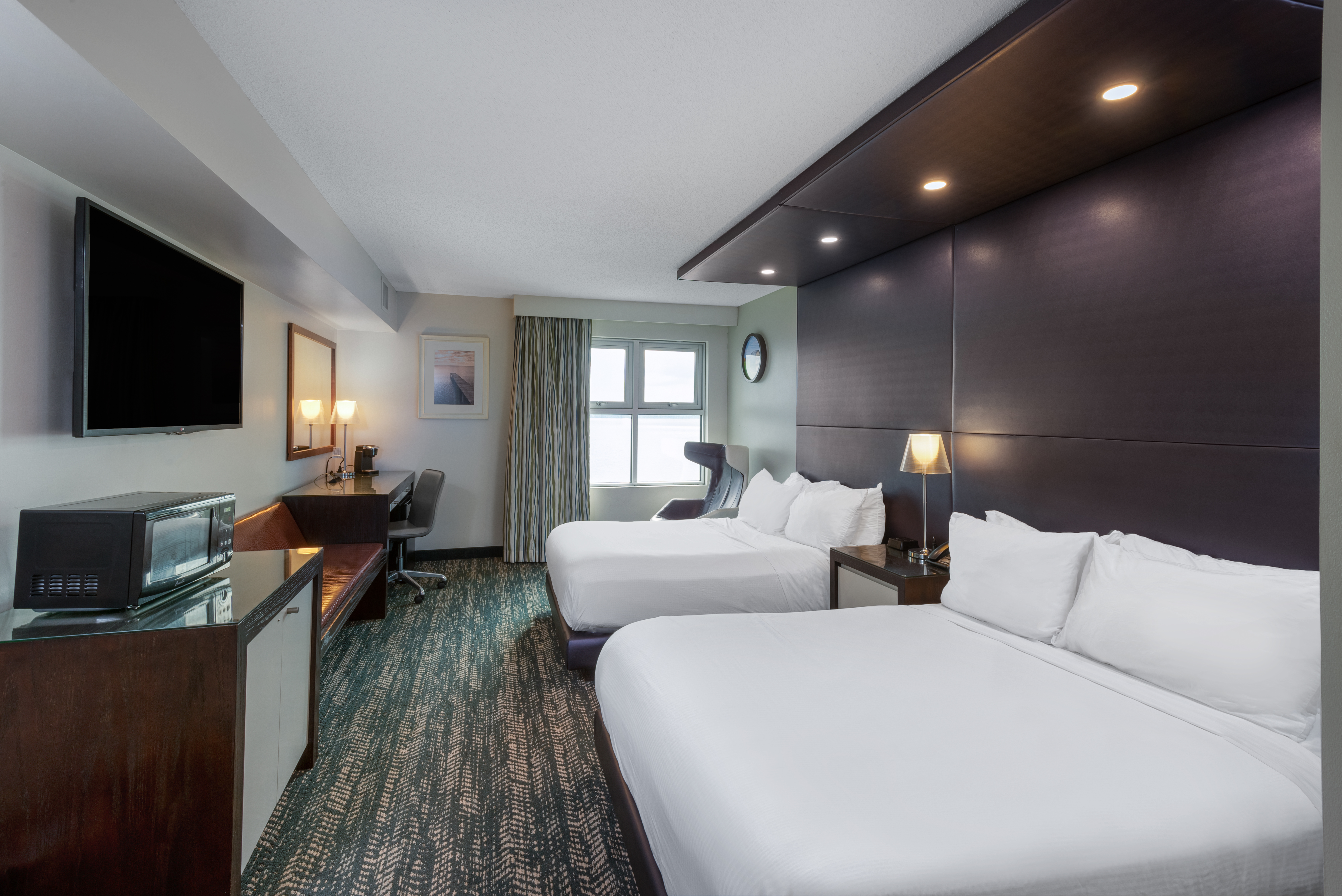 Guest room at the 41 Lakefront Hotel, Trademark Collection By Wyndham in Geneva, New York