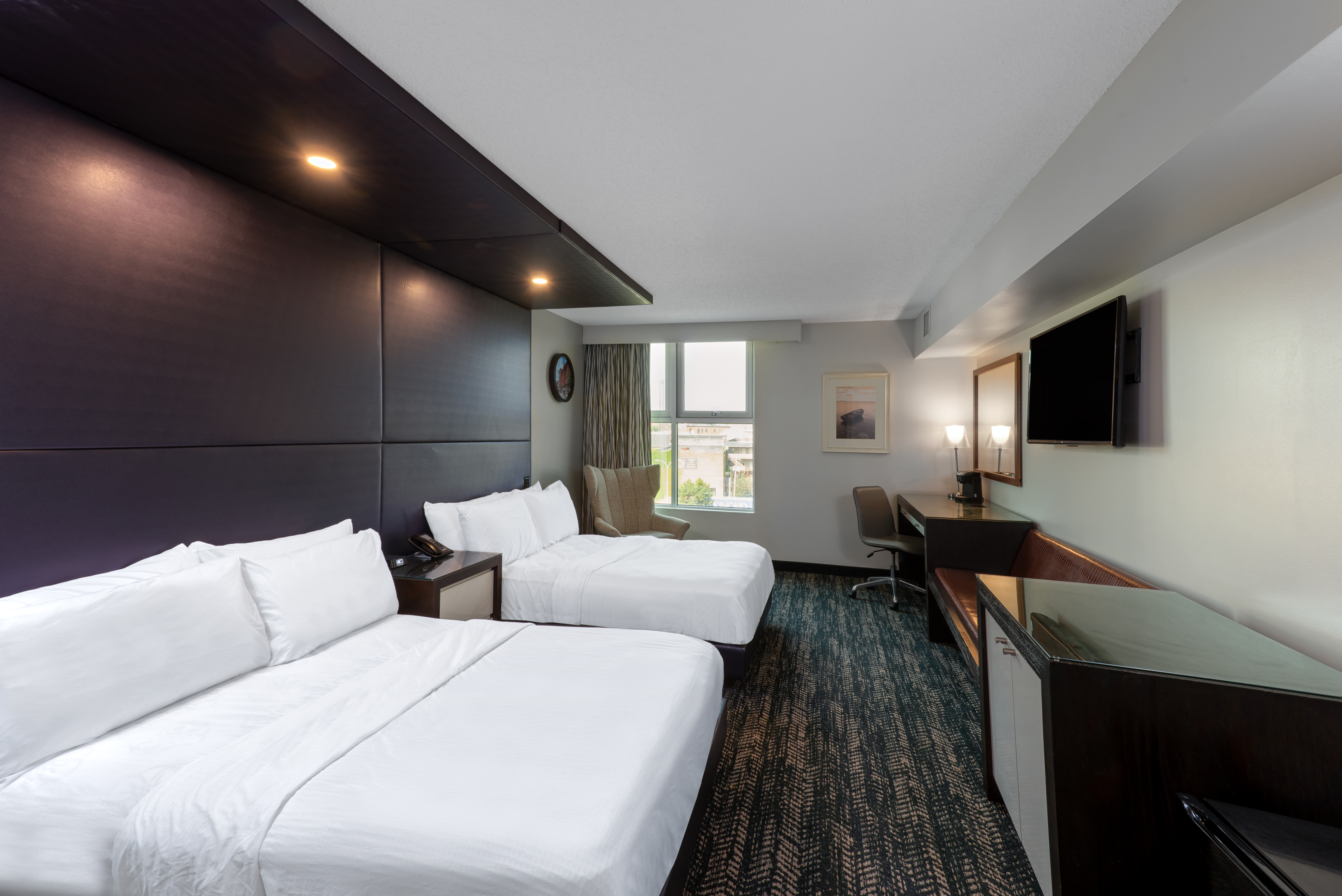 Guest room at the 41 Lakefront Hotel, Trademark Collection By Wyndham in Geneva, New York